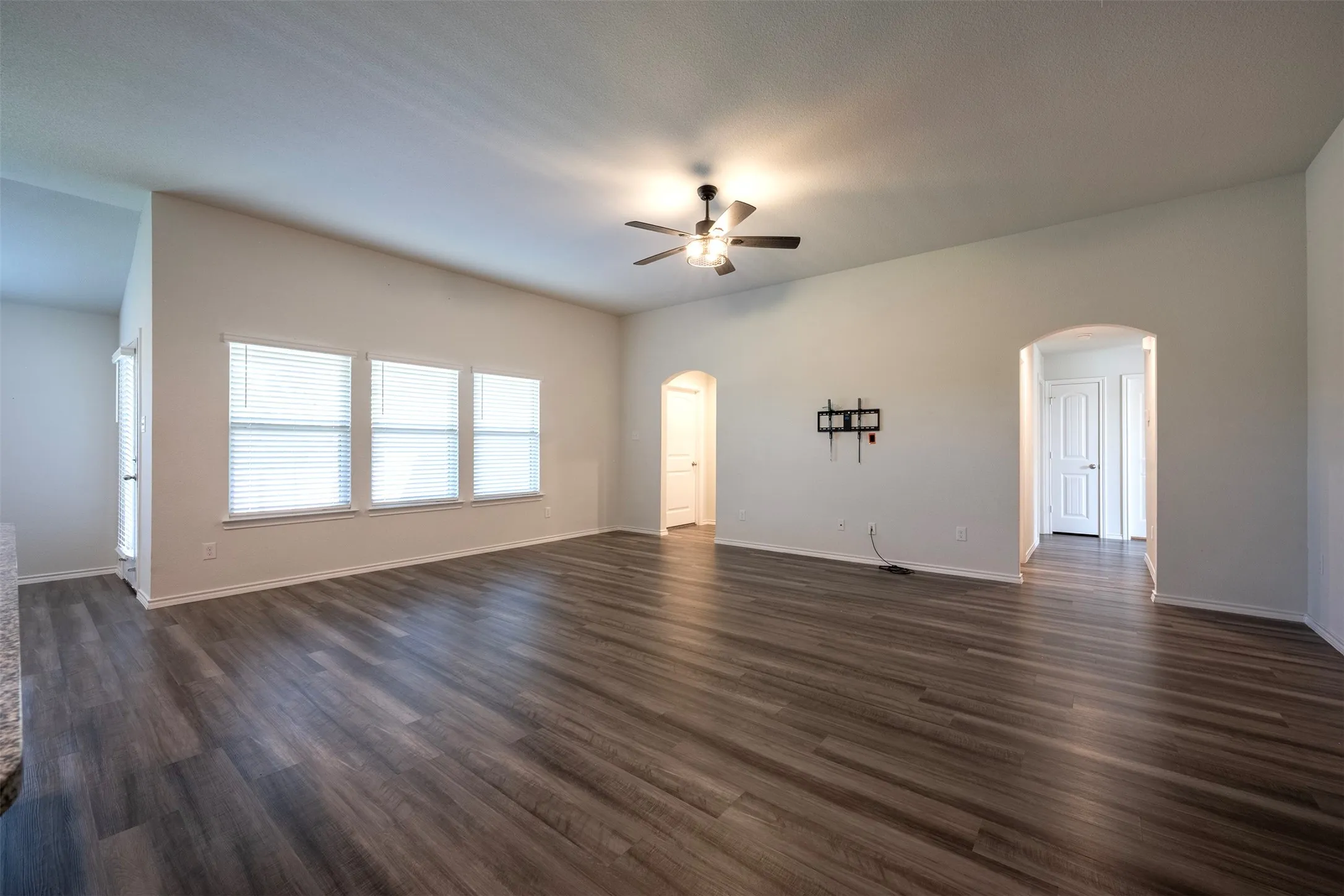 Three windows overlooking the back yard - offer plenty of light.