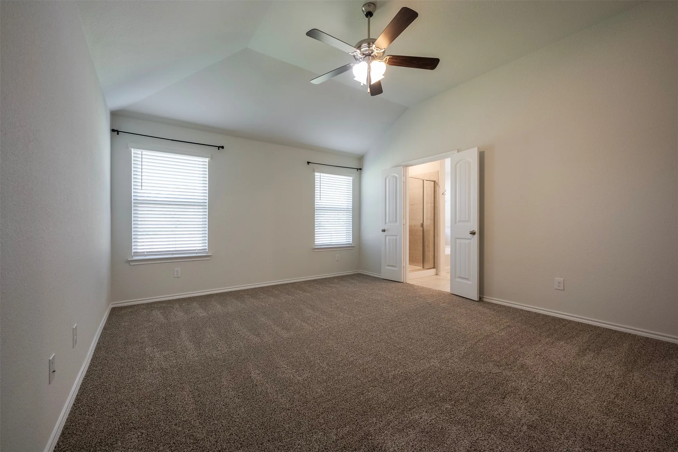 Primary Suite - fresh carpet, convenient Celinng Fan