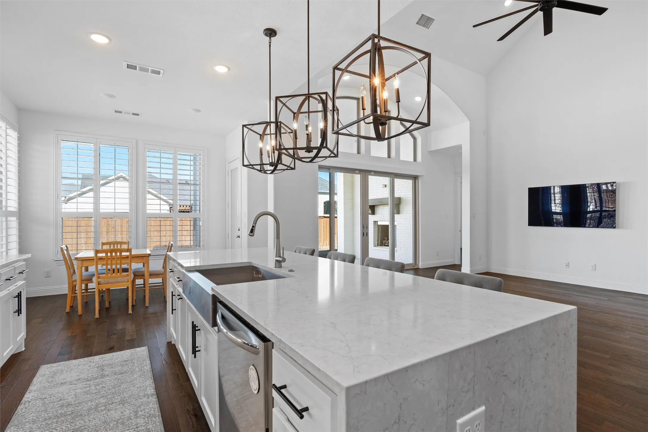 The kitchen island is MASSIVE! ?? Perfect for meal prep, entertaining, or just laying out a massive charcuterie board. ???? Plus, those pendant lights are a vibe. ? #KitchenIsland #EntertainingSpace #DreamKitchen