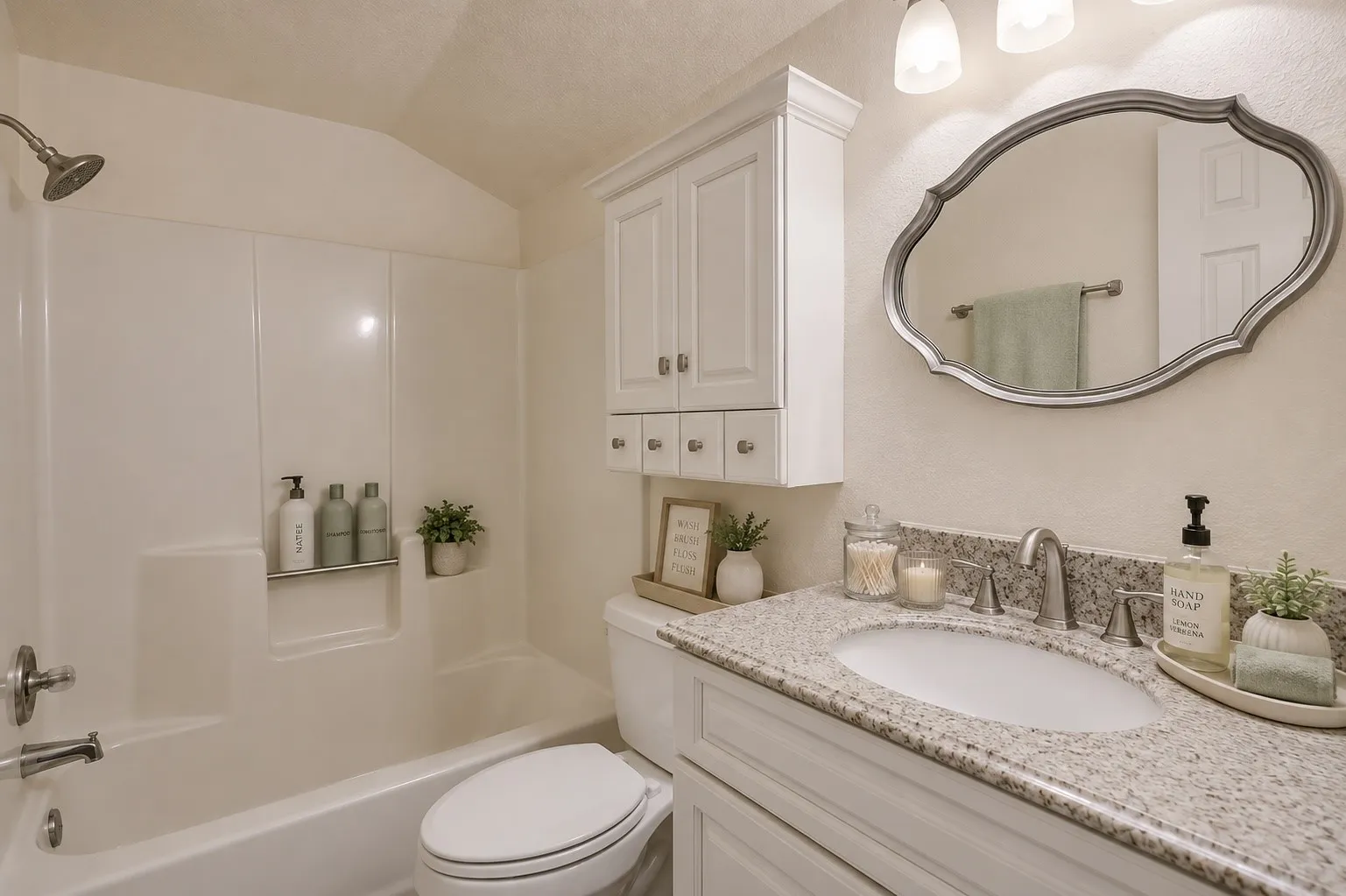 Upstairs bath with tub and shower and storage.