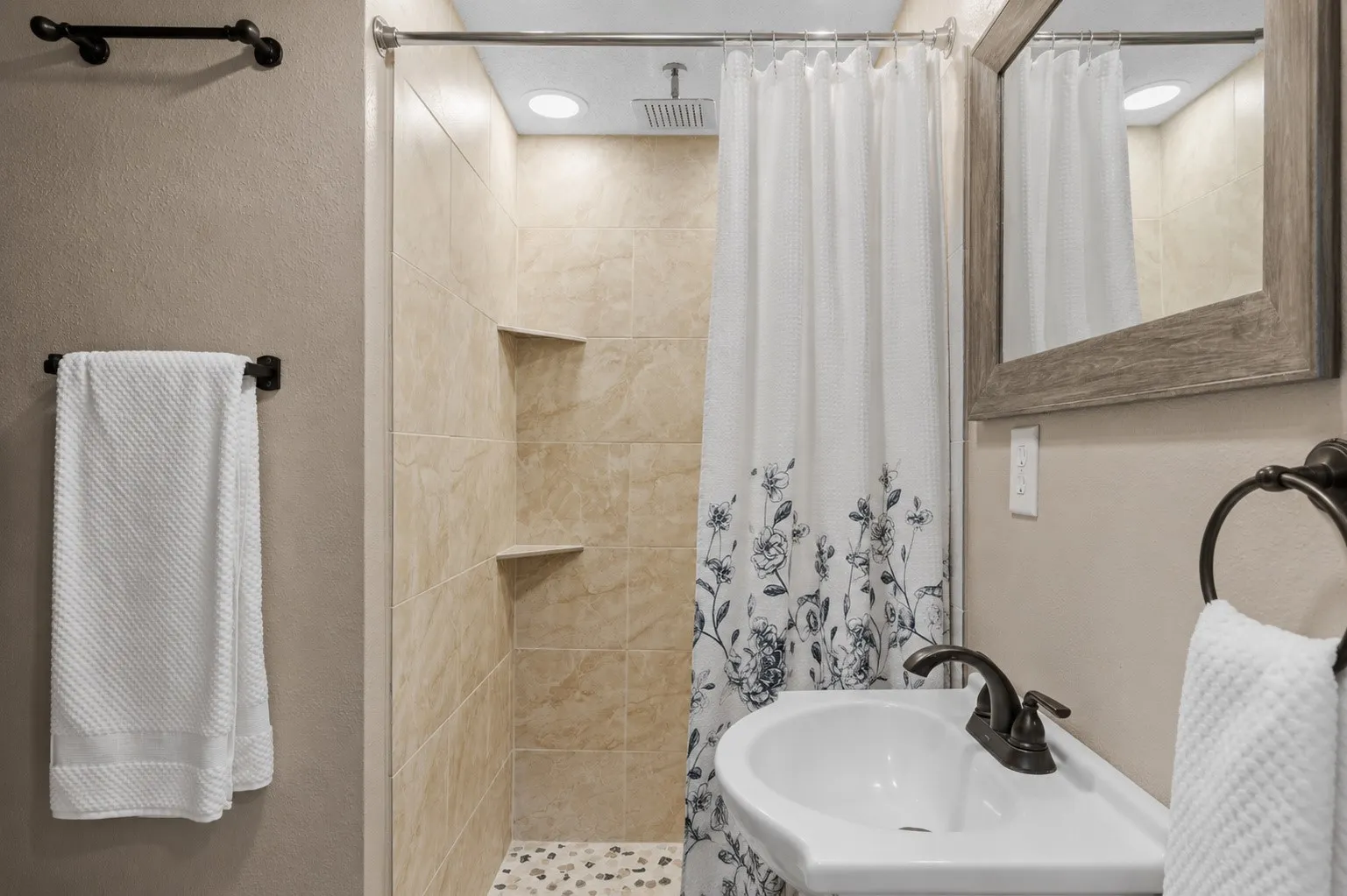 Full bath with walk in shower downstairs