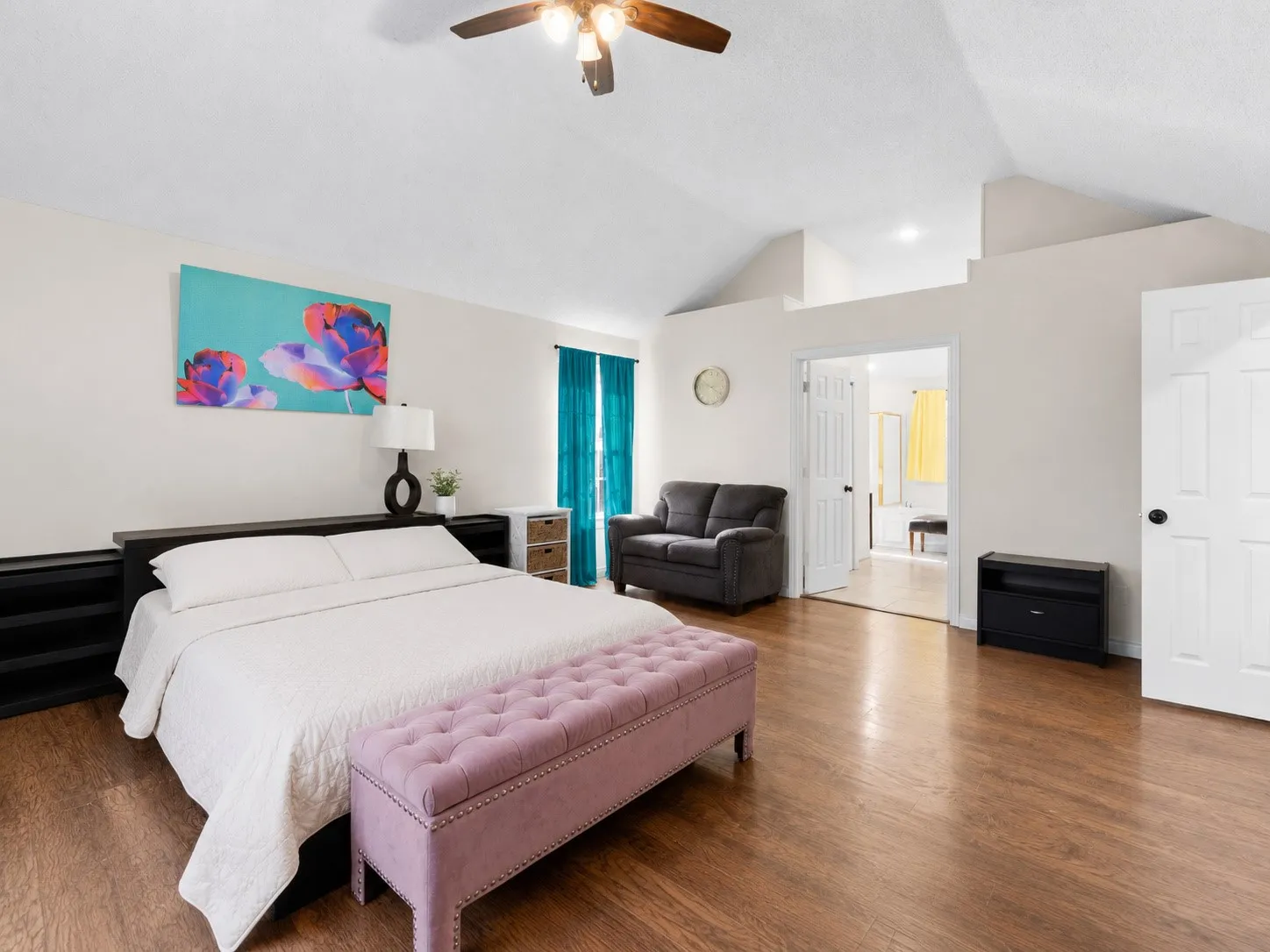 Primary suite with vaulted ceilings