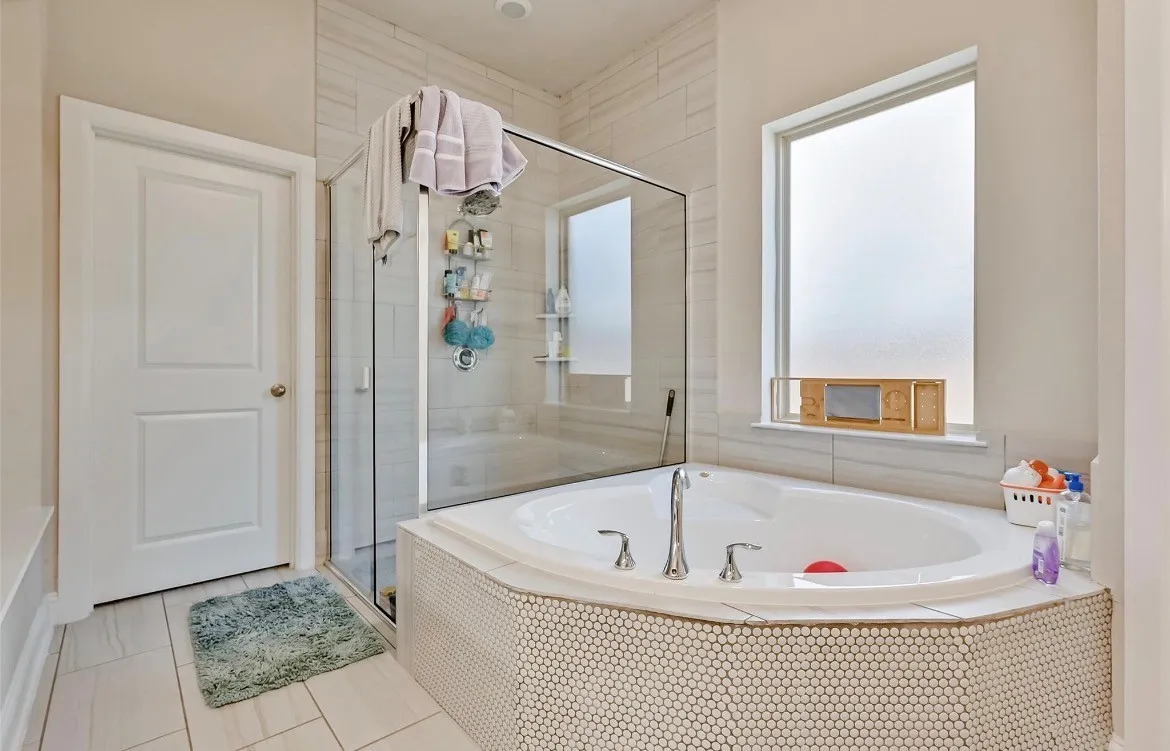 Oversized tub and shower primary bathroom