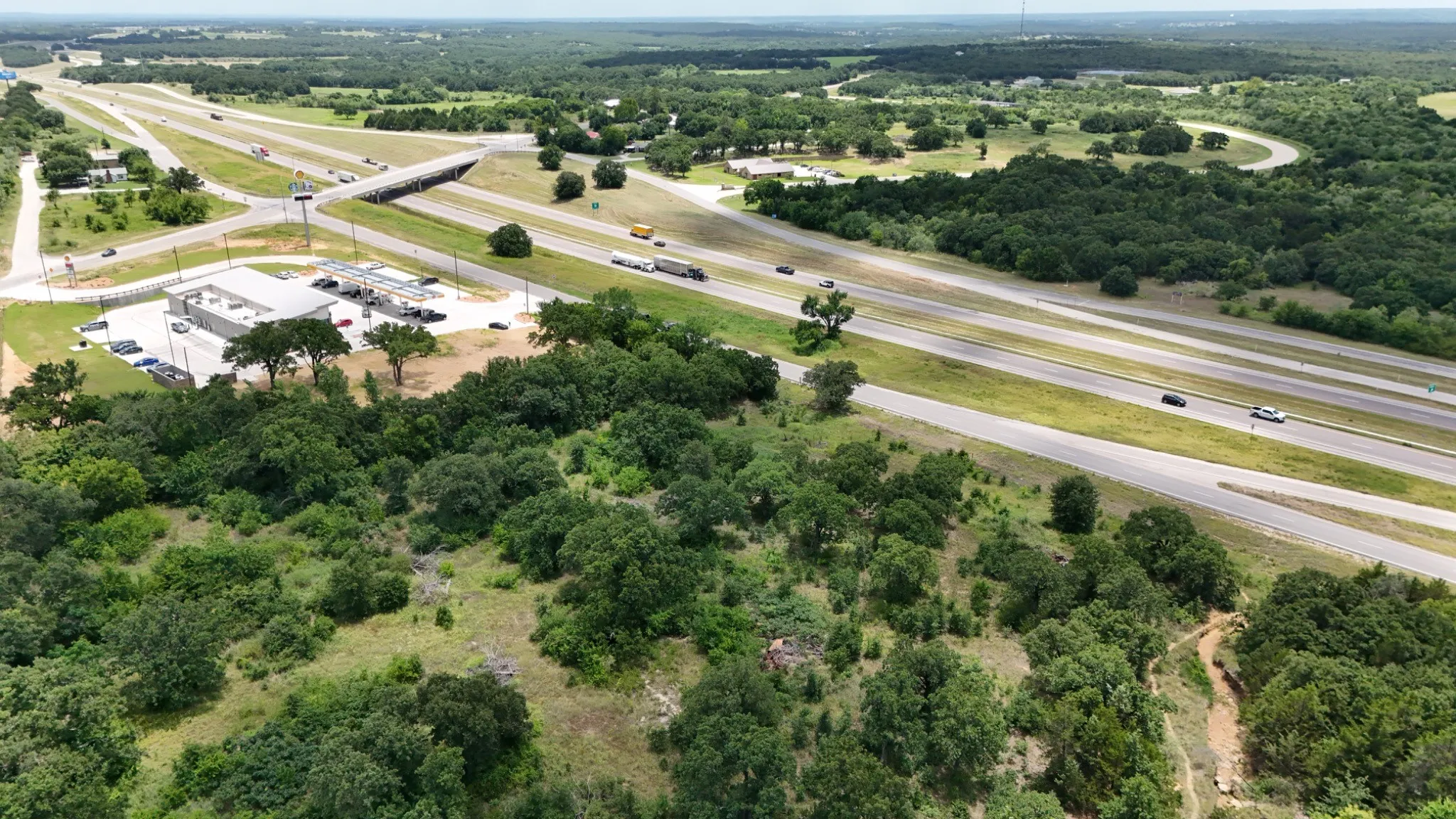 Prime commercial or industrial acreage with direct highway access along a major thoroughfare