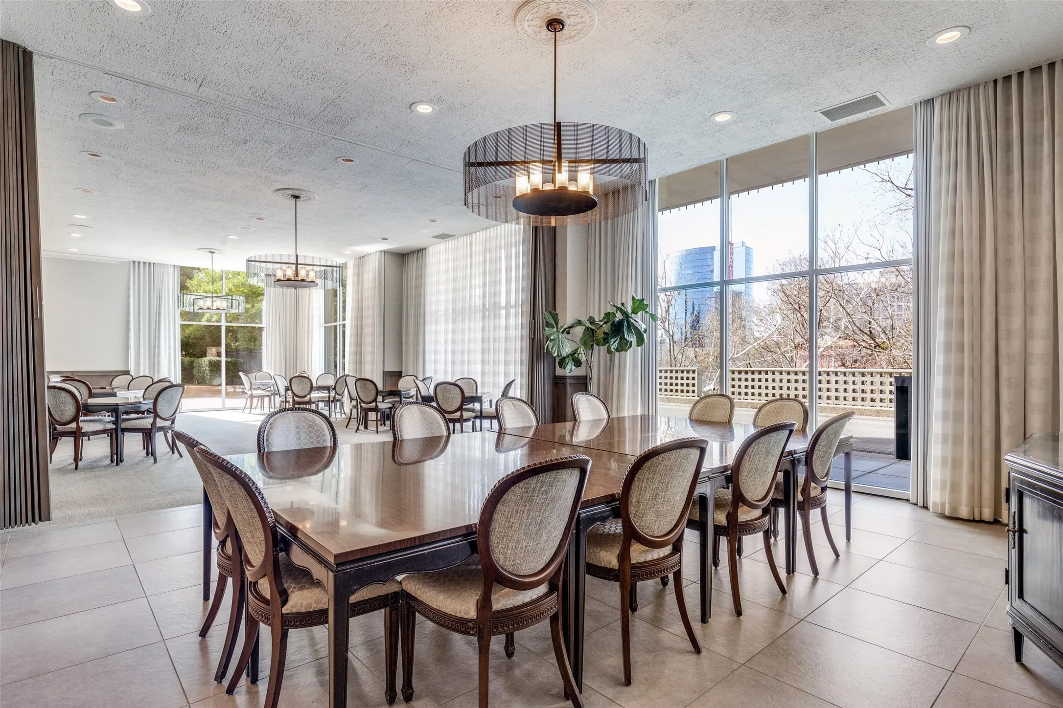 The dining room for private gatherings features a catering kitchen (not shown) and so many community spaces to enjoy with your neighbors.