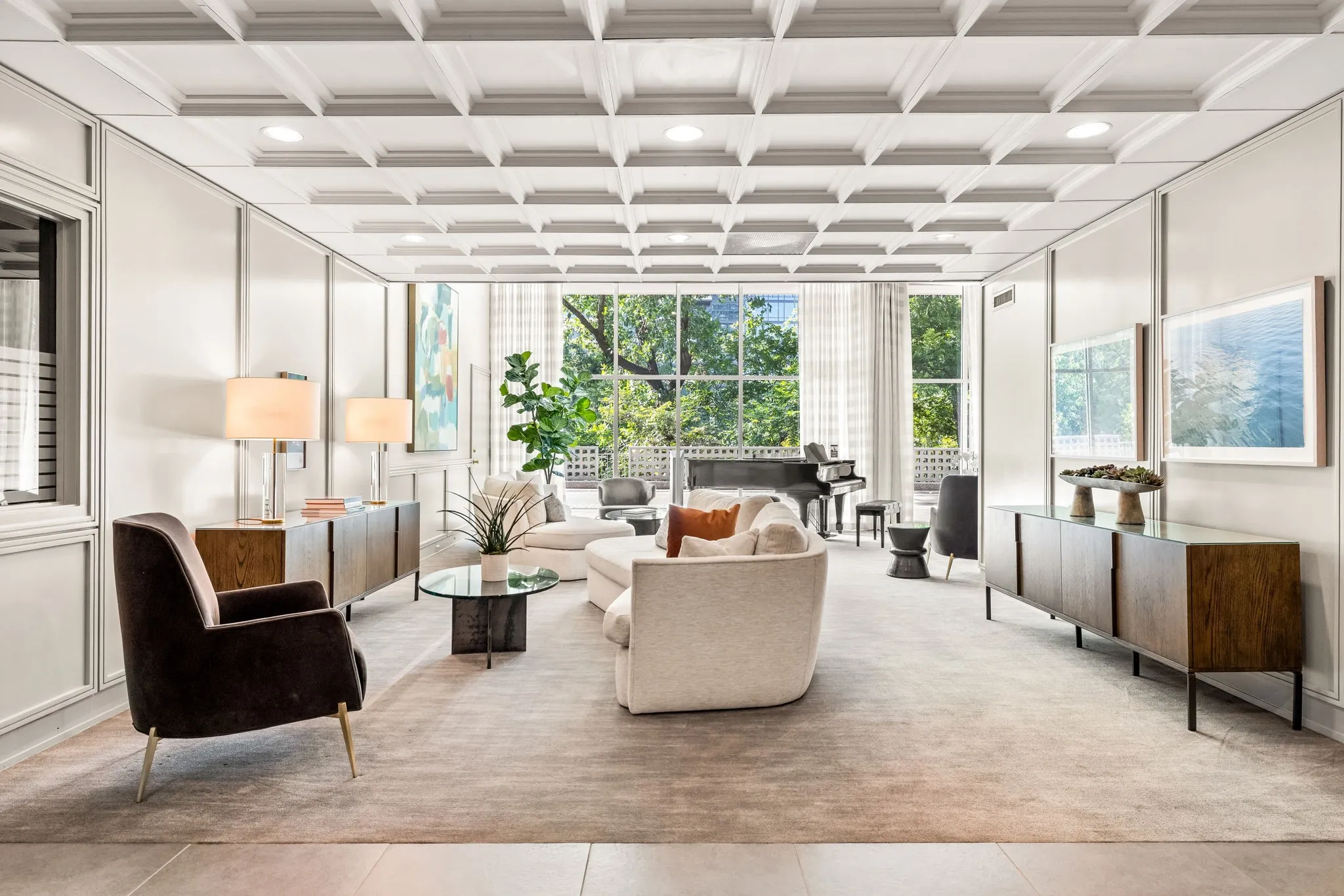 Amenities include a fitness center, guest suites, party room with a full catering kitchen, and a poolside entertaining room with a bar and tables, available for private use, storage, valet trash, package delivery and car-wash station.