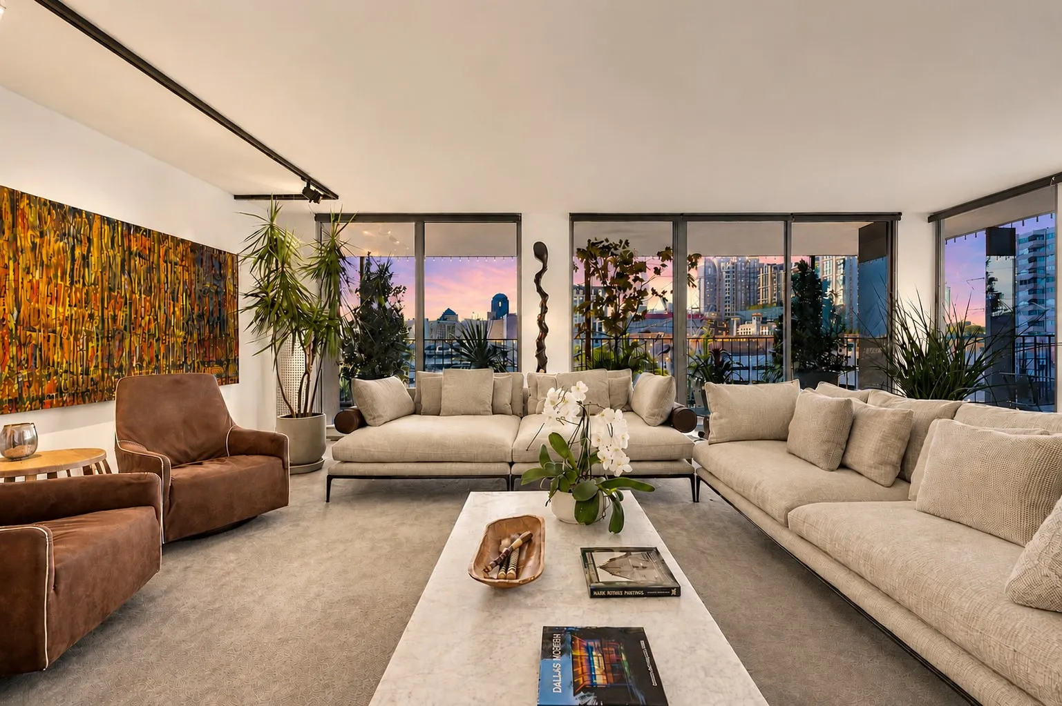 Twilight evenings offer panoramic cityscape vistas; this architecturally significant home is as timeless as it is inviting.