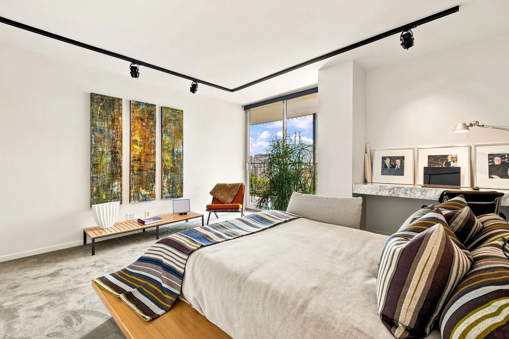 The secondary bedroom is generously sized for guests or family to enjoy.
