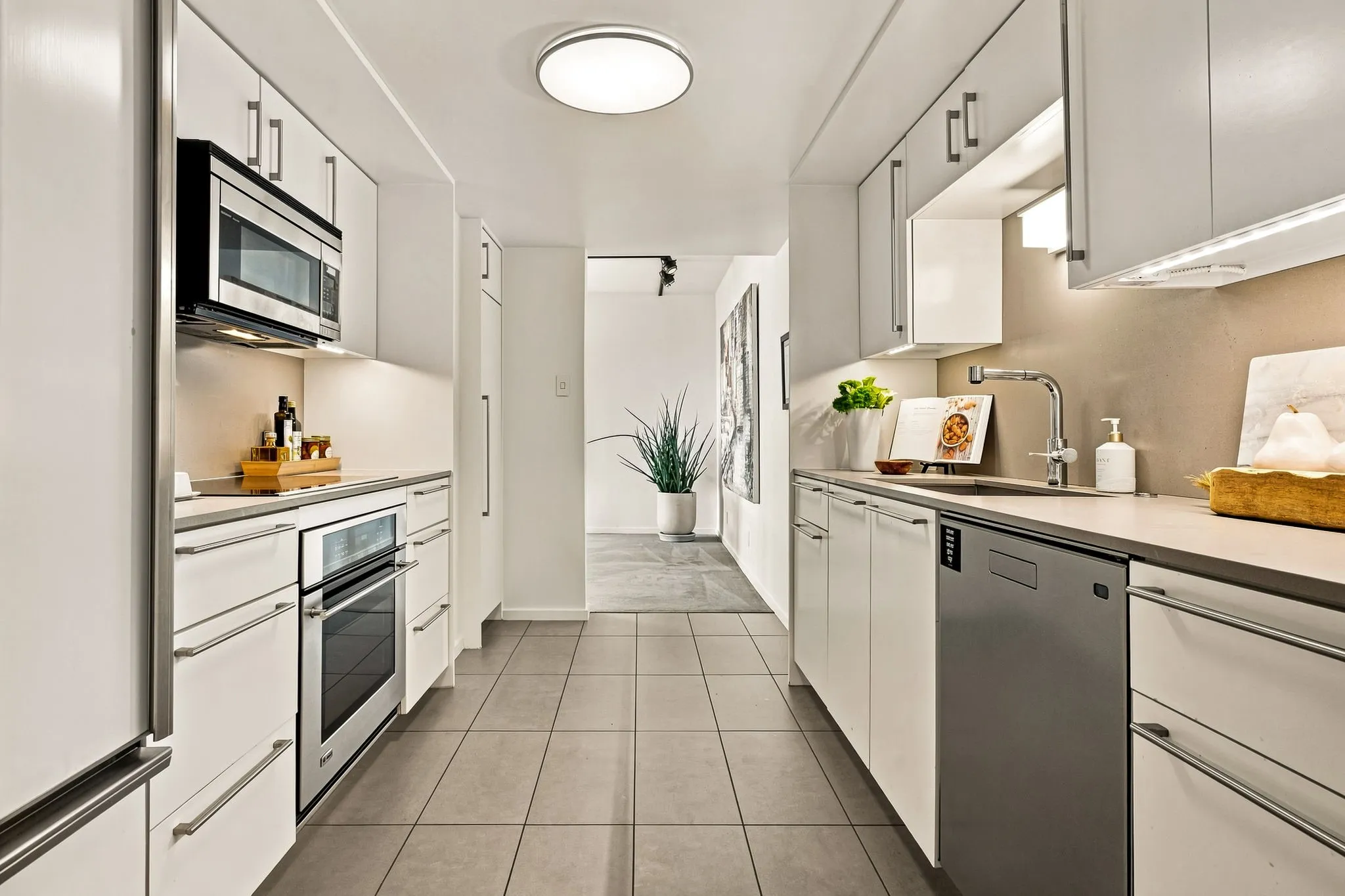 Sub-Zero, Bosch and Asko brands compliment this boutique kitchen, which has just the right amount of storage.