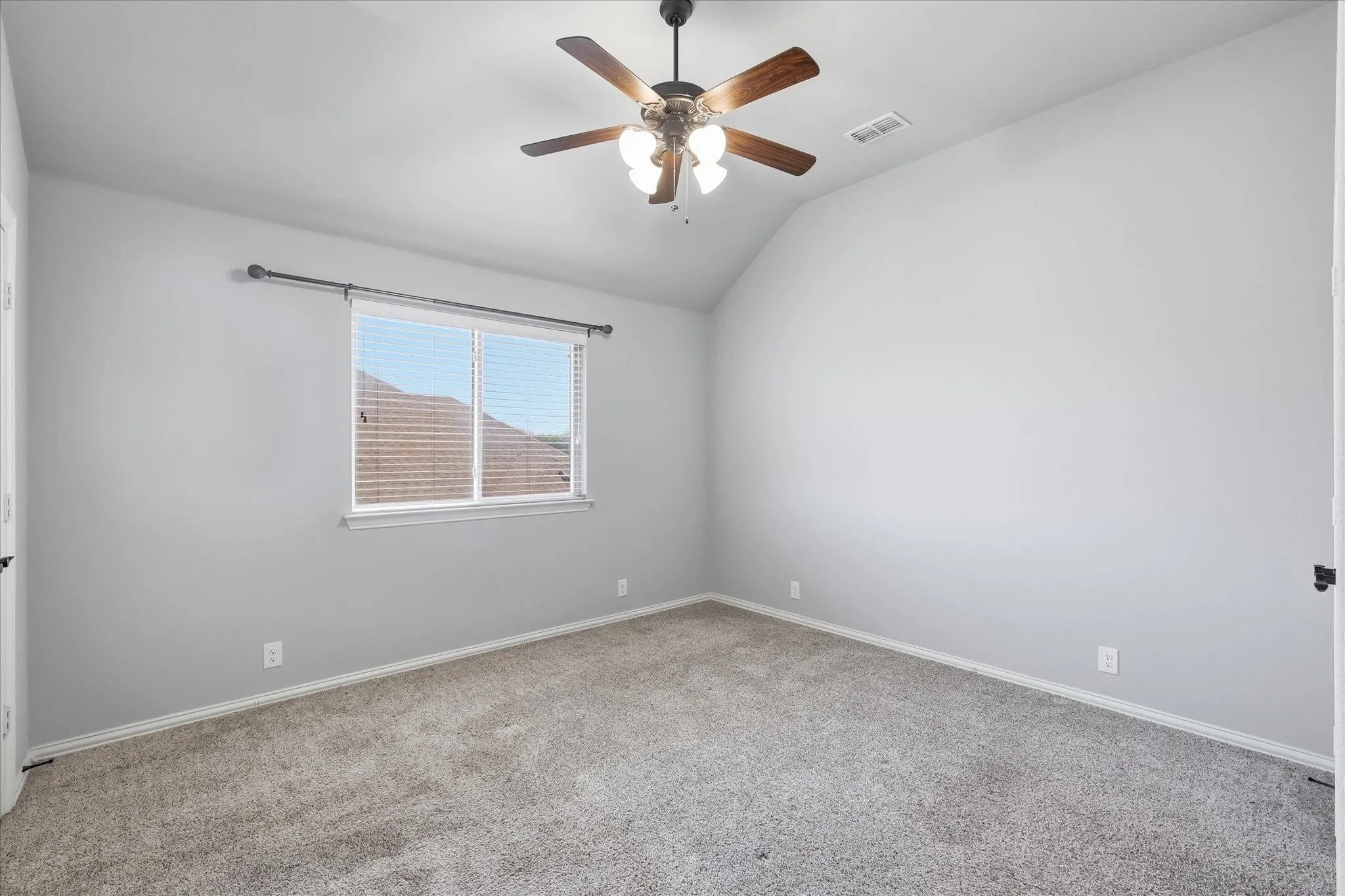 Secondary bedroom with walk in closet