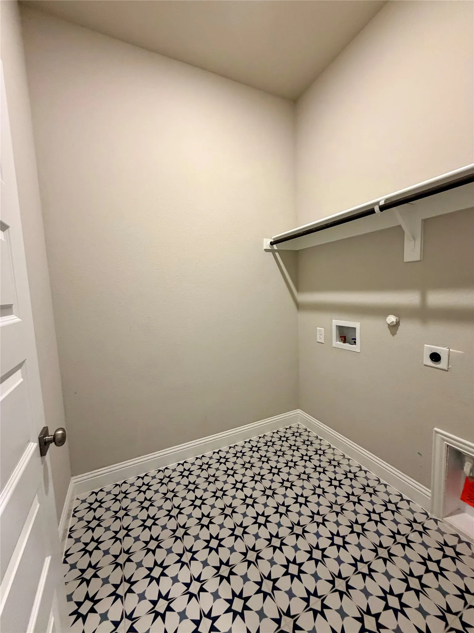 Laundry room with fun decorative tile