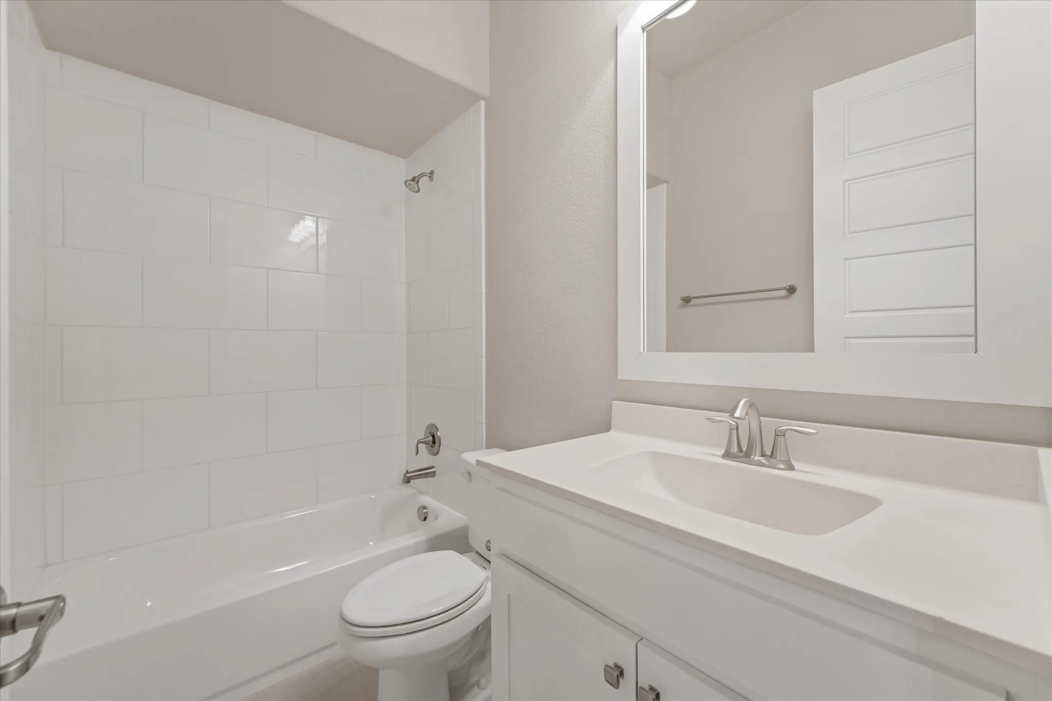 2nd bath:Ensuite to second primary / mother in law wing on first level