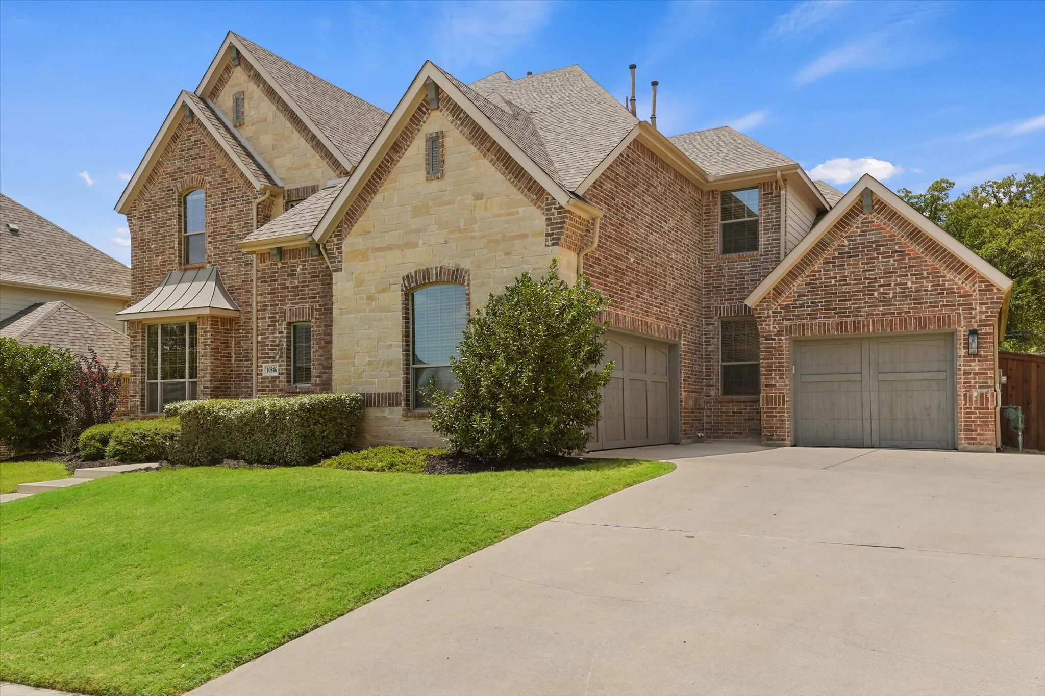 This gorgeous almost 5,000 sqft home features a 3 car garage, a gorgeous brick and stone elevation, over a quarter acre lot that backs up to a quiet greenbelt for extra privacy, and the perfect layout with two of the five bedrooms on the first floor, as well as a dedicated office!