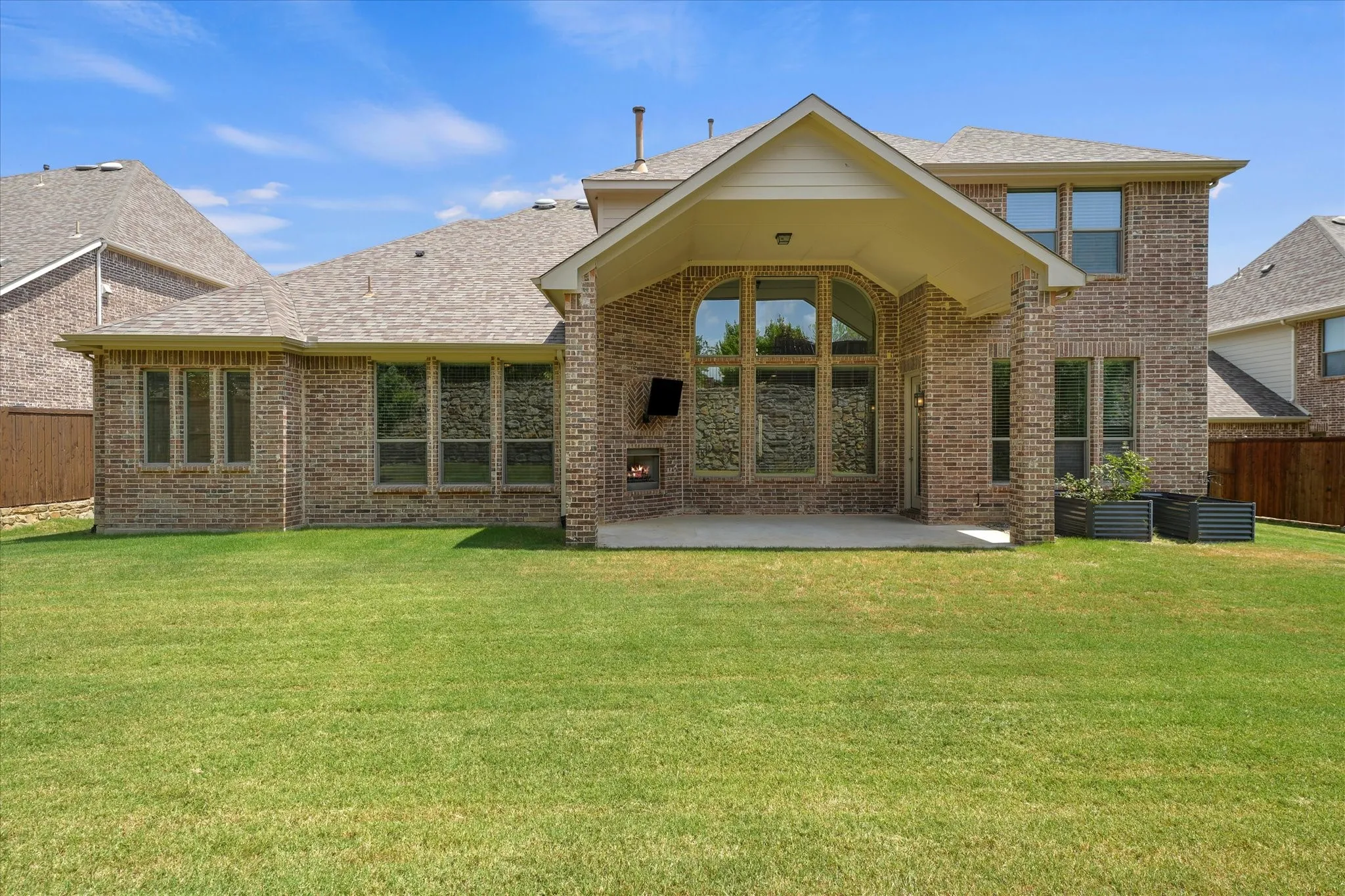 This yard is huge as the home sits on over a quarter acer lot! There is room here for endless ideas like a great pool and more. The stone wall and stained fence are in great condition. The yard is well maintained. The backyard backs up to a greenbelt for extra quiet and privacy.