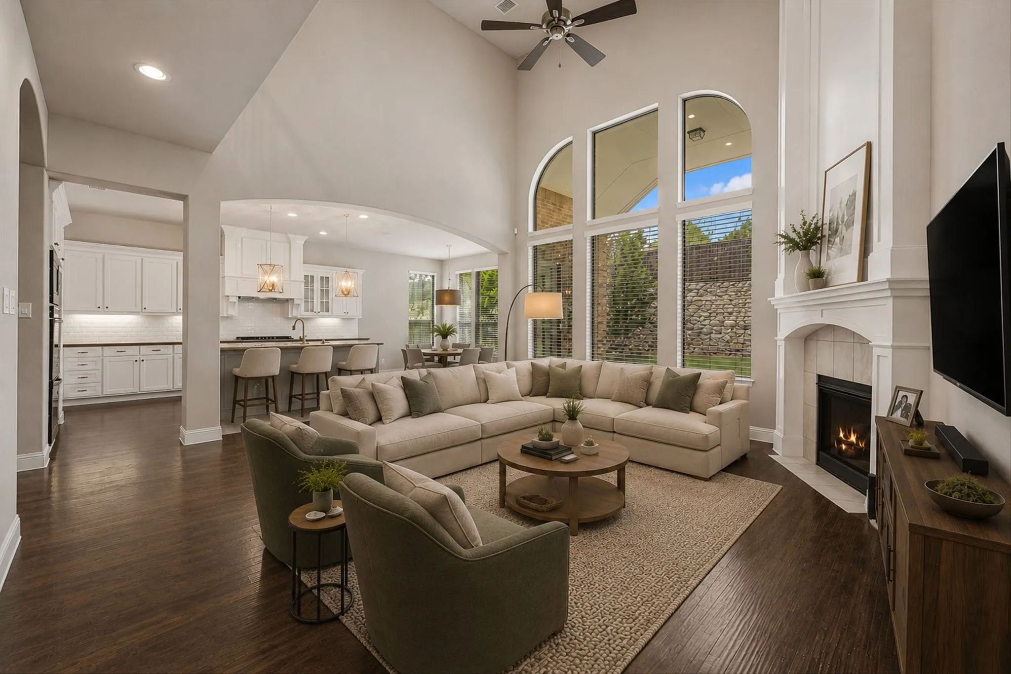 This photo includes AI Staging to showcase the living room potential. The home features fresh paint throughout on every surface of the 4,971 sq ft home! (walls, ceiling, doors, trim, baseboards, molding, cabinets, etc) It shines like new! This entire home has been refreshed with even new carpet on the upper level too! First floor showcases hand scraped hardwood floors. Kitchen features built in SS appliances, a gas cooktop, tons of storage, granite and quartz countertops, a deep farmhouse sink, gorgeous lighting fixtures, an island with room for barstools, eat in kitchen, open floor plan, and more!