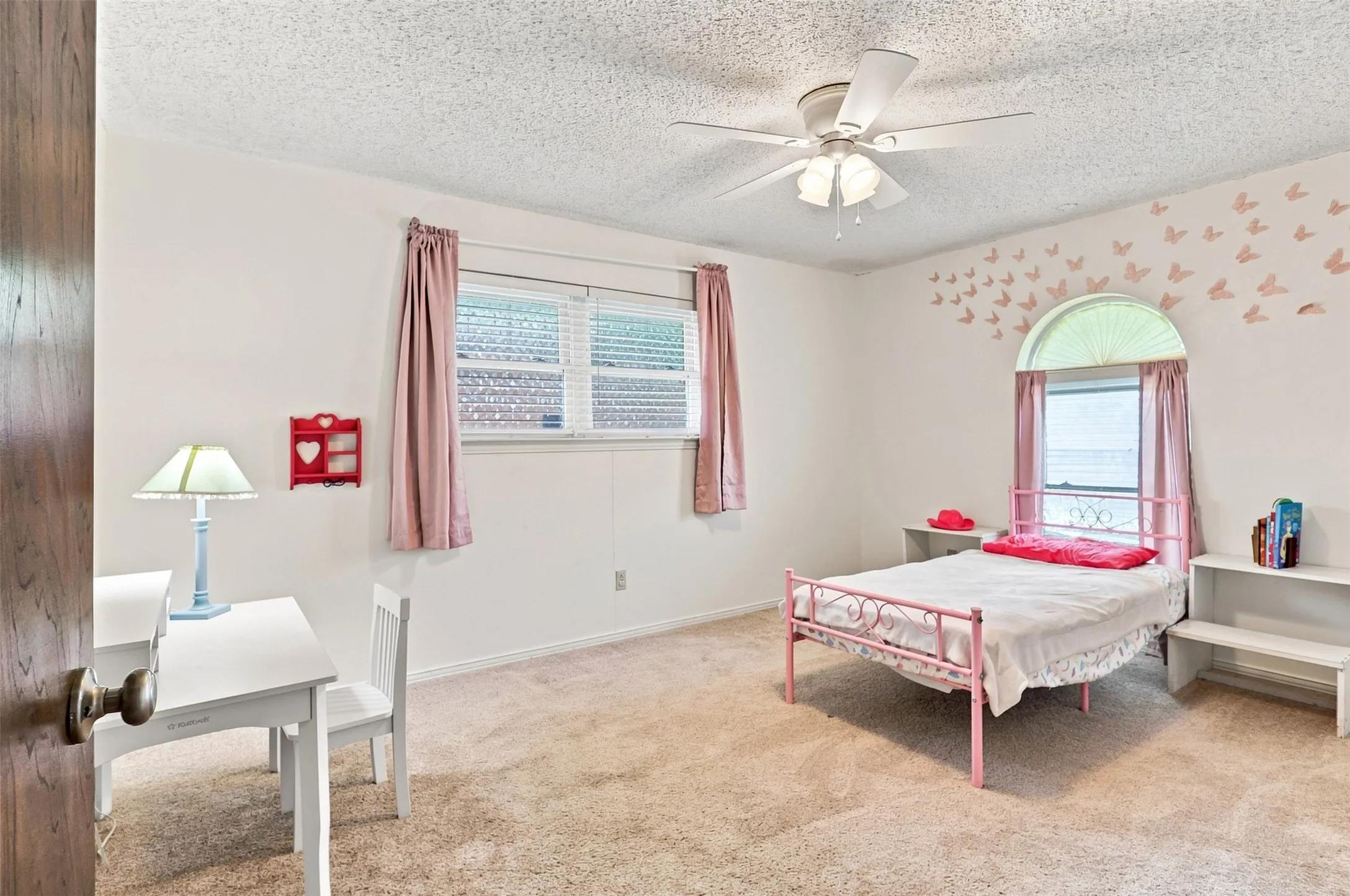 Spacious bedroom with walk-in closet.