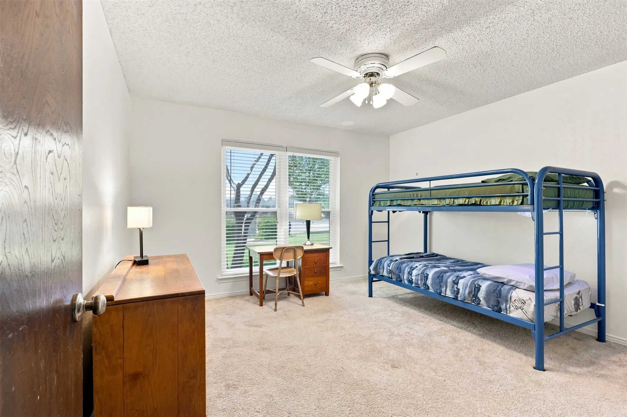 Spacious bedroom with walk-in closet.