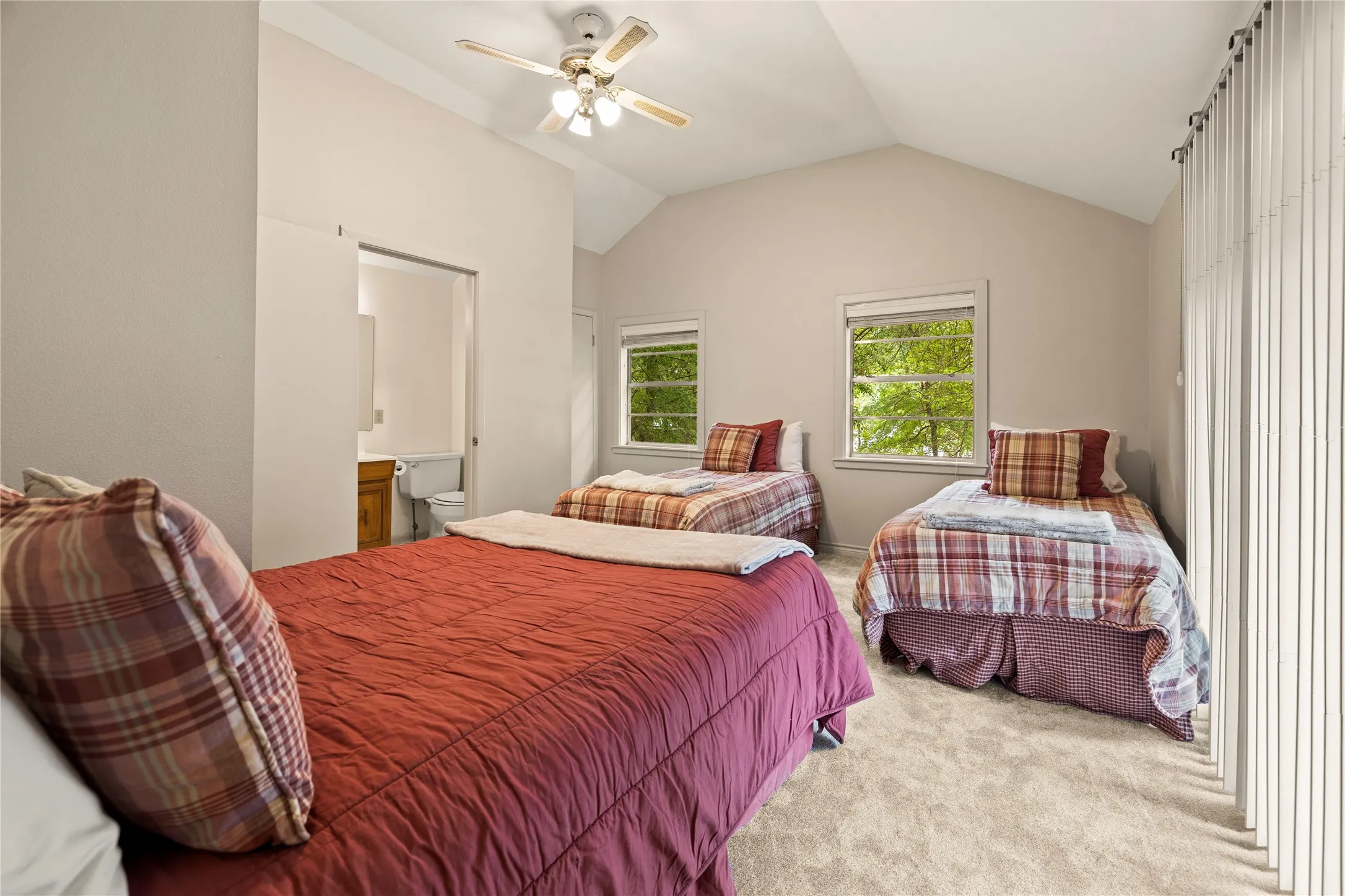 This image has not been altered and depicts the room in its current state with the capacity to accommodate multiple beds.
