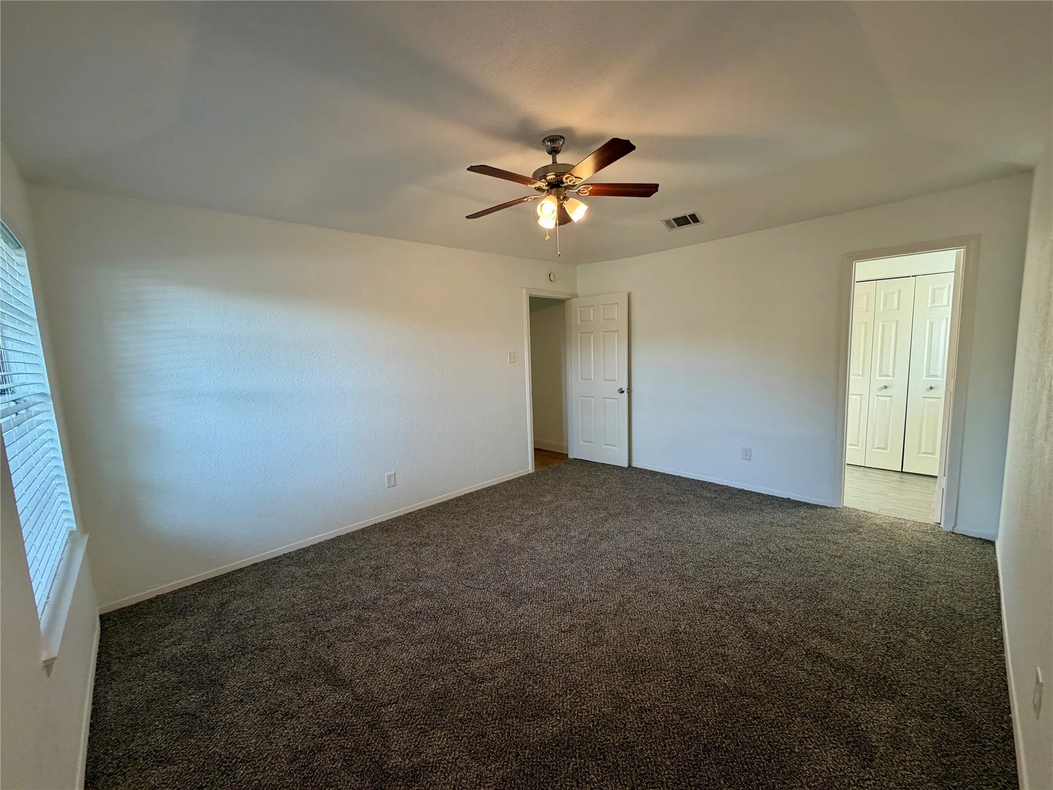 Primary bedroom with ensuite bathroom