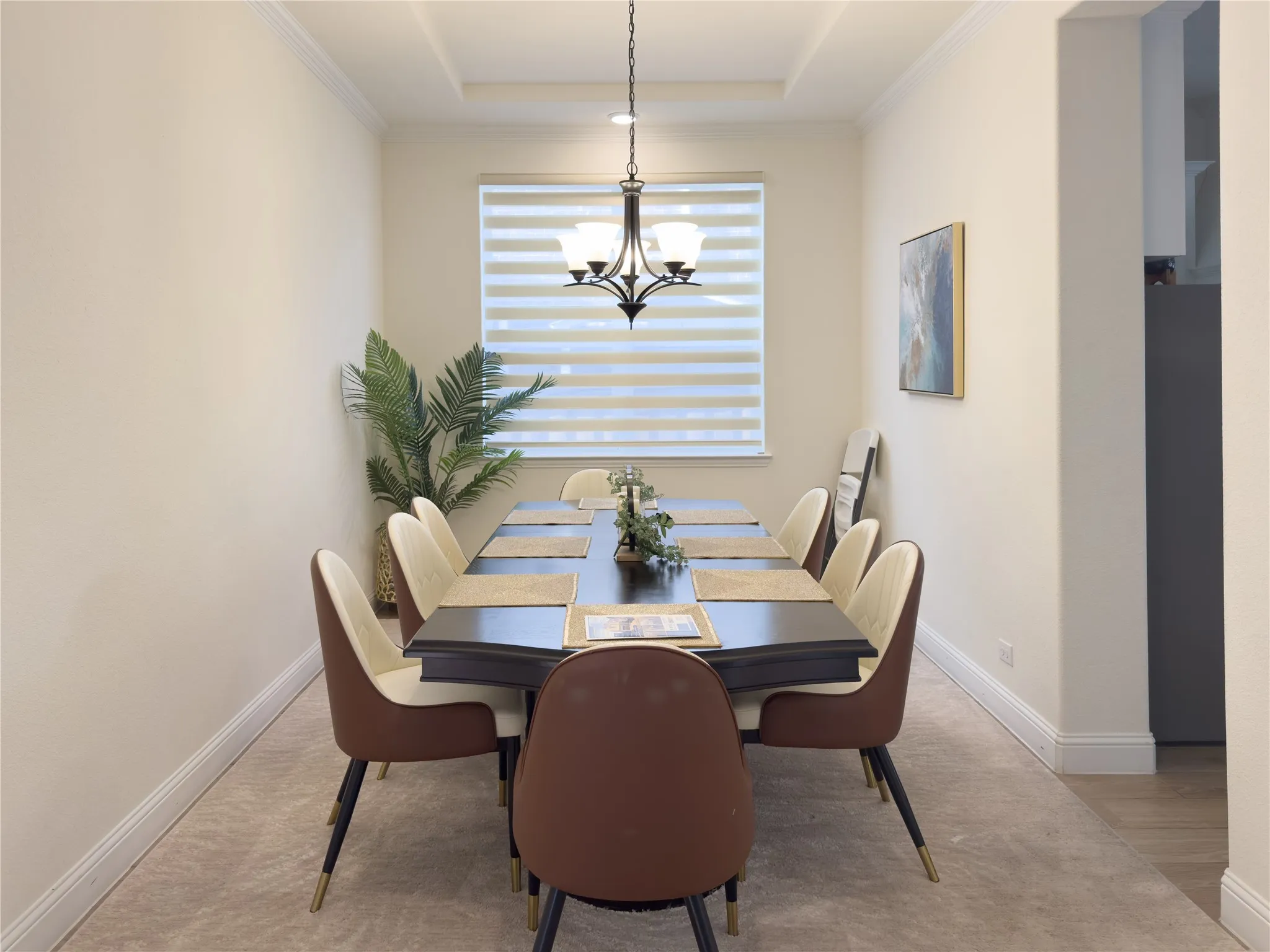 Tray ceiling with a decorative chandelier
