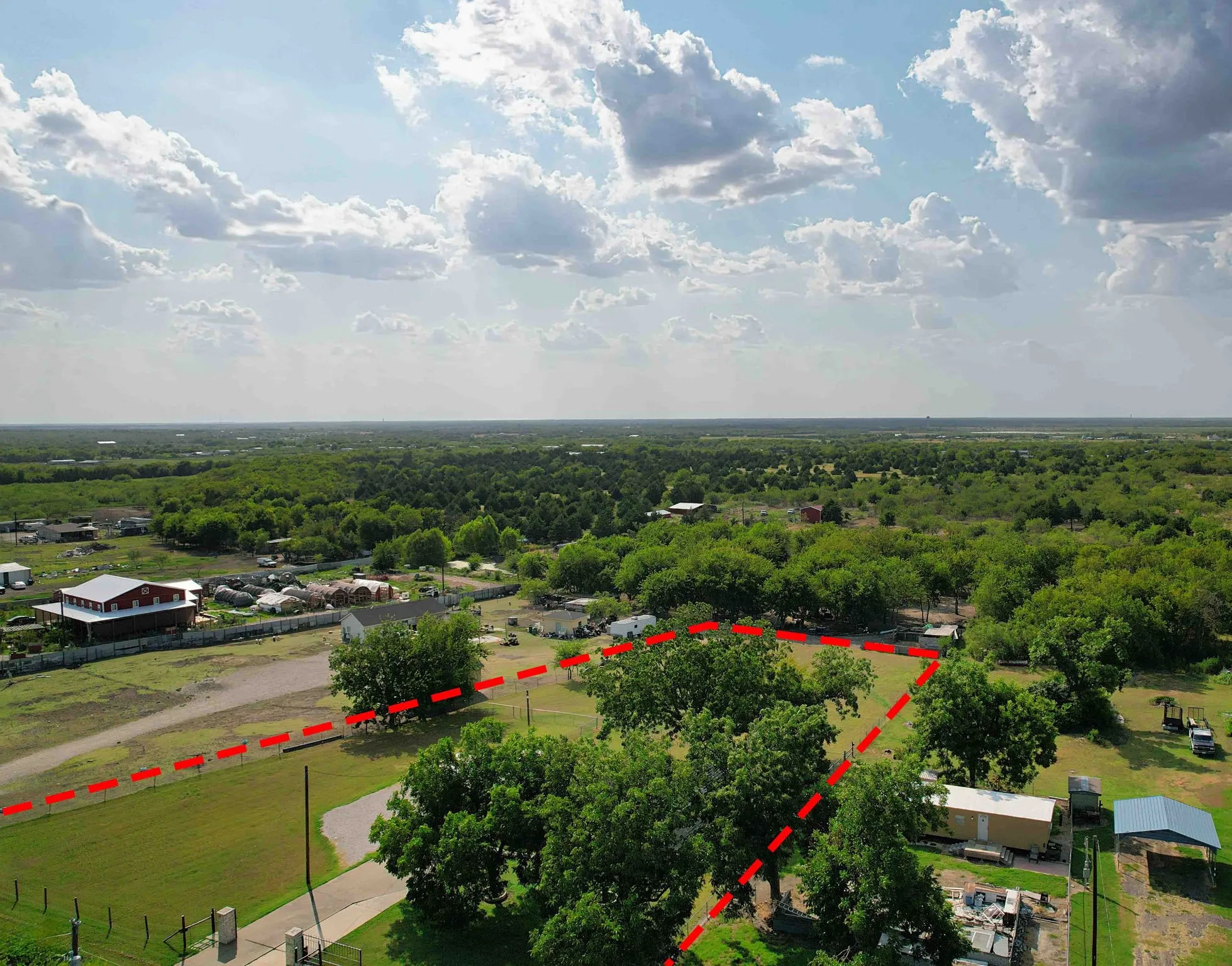Expansive lot featuring mature trees and open terrain