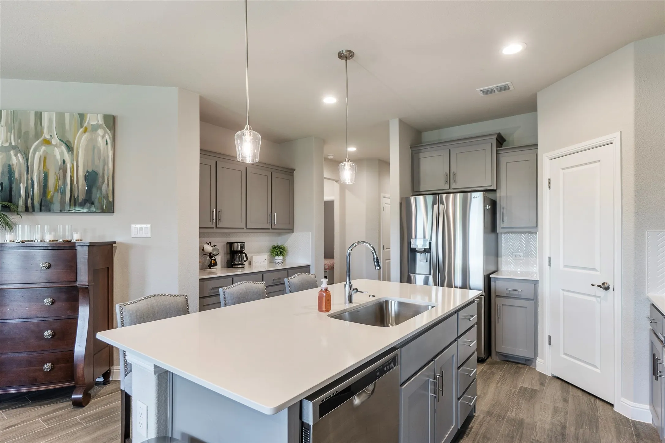 Tons of cabinet storage & big pantry
