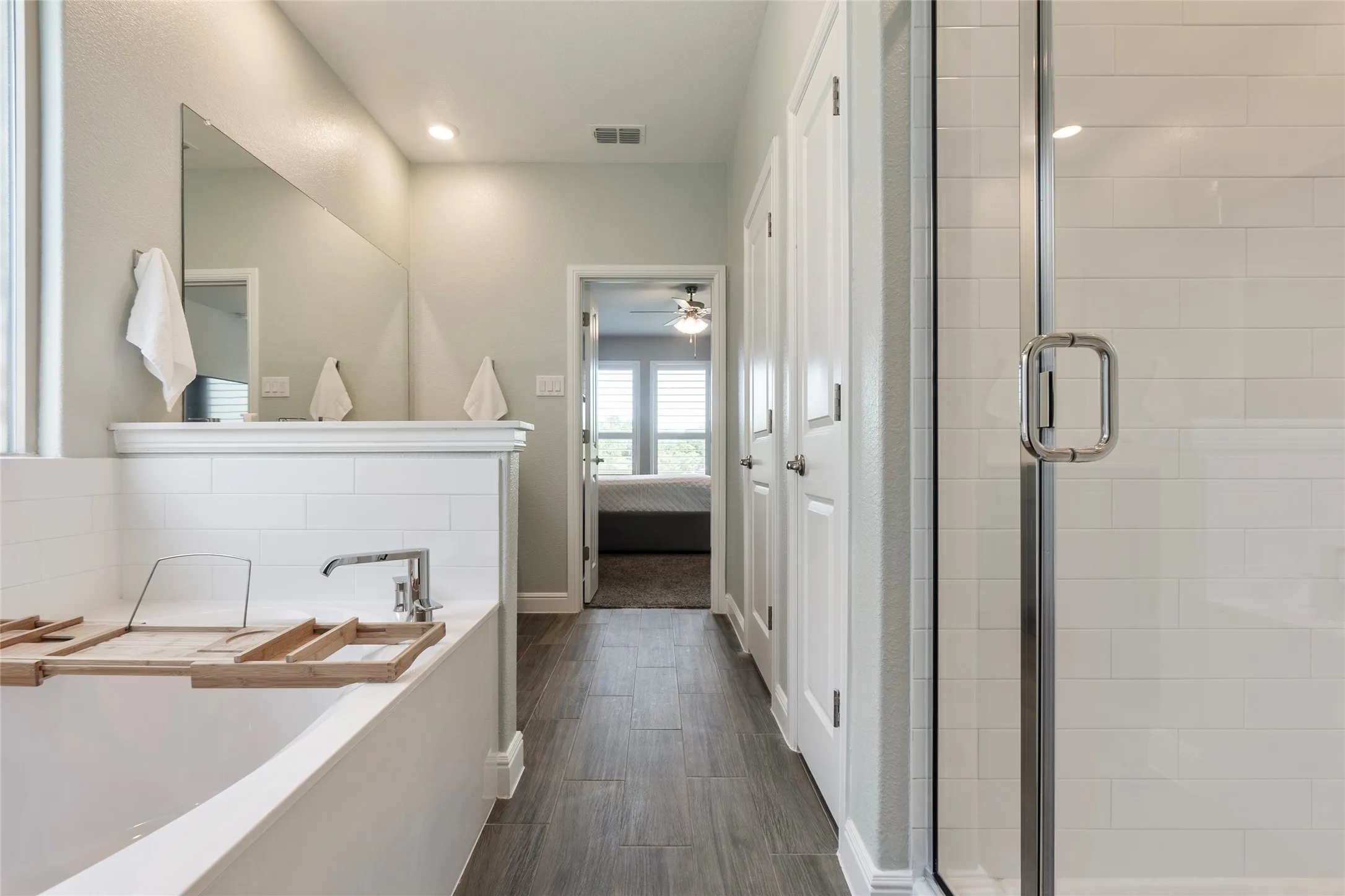 Separate shower, linen closet & water closet