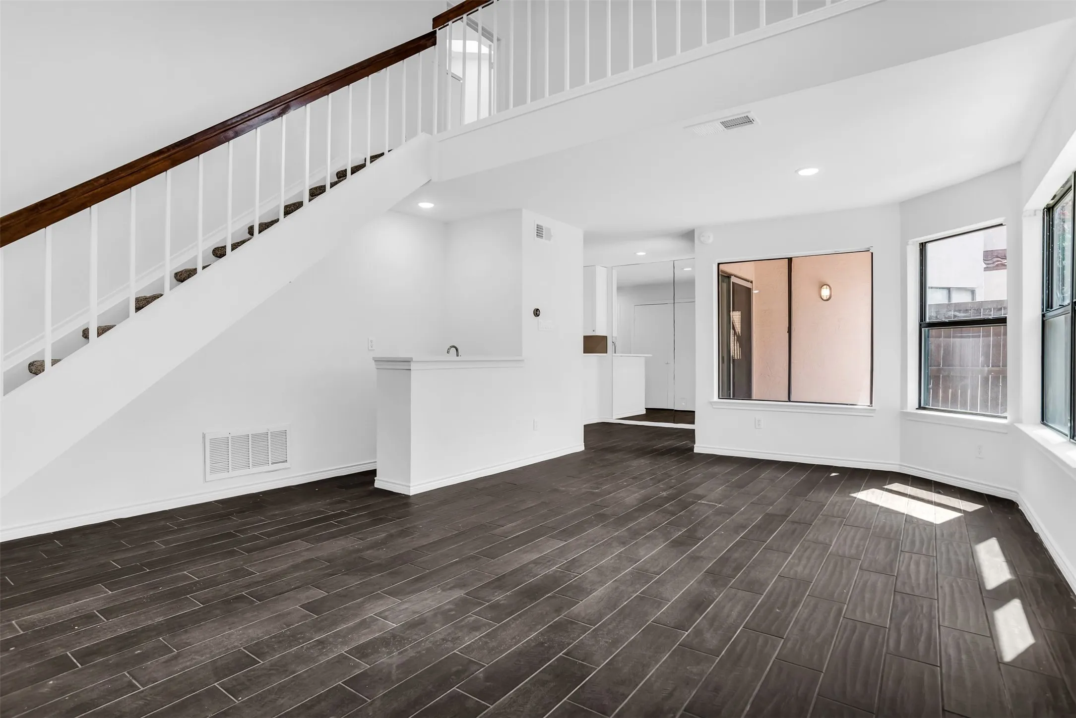 Wood-finish flooring throughout the main level