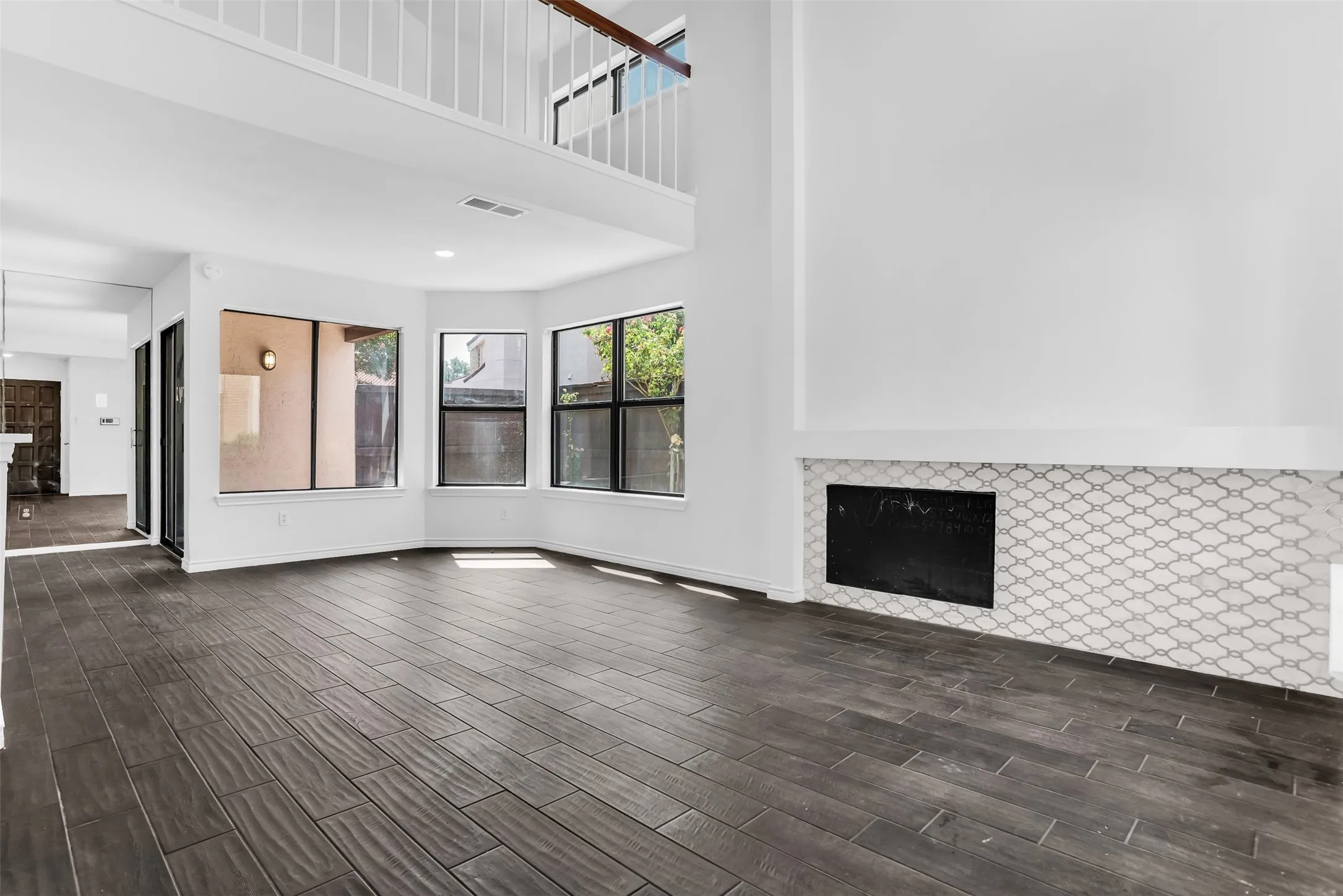 Soaring ceilings and wood-finish flooring