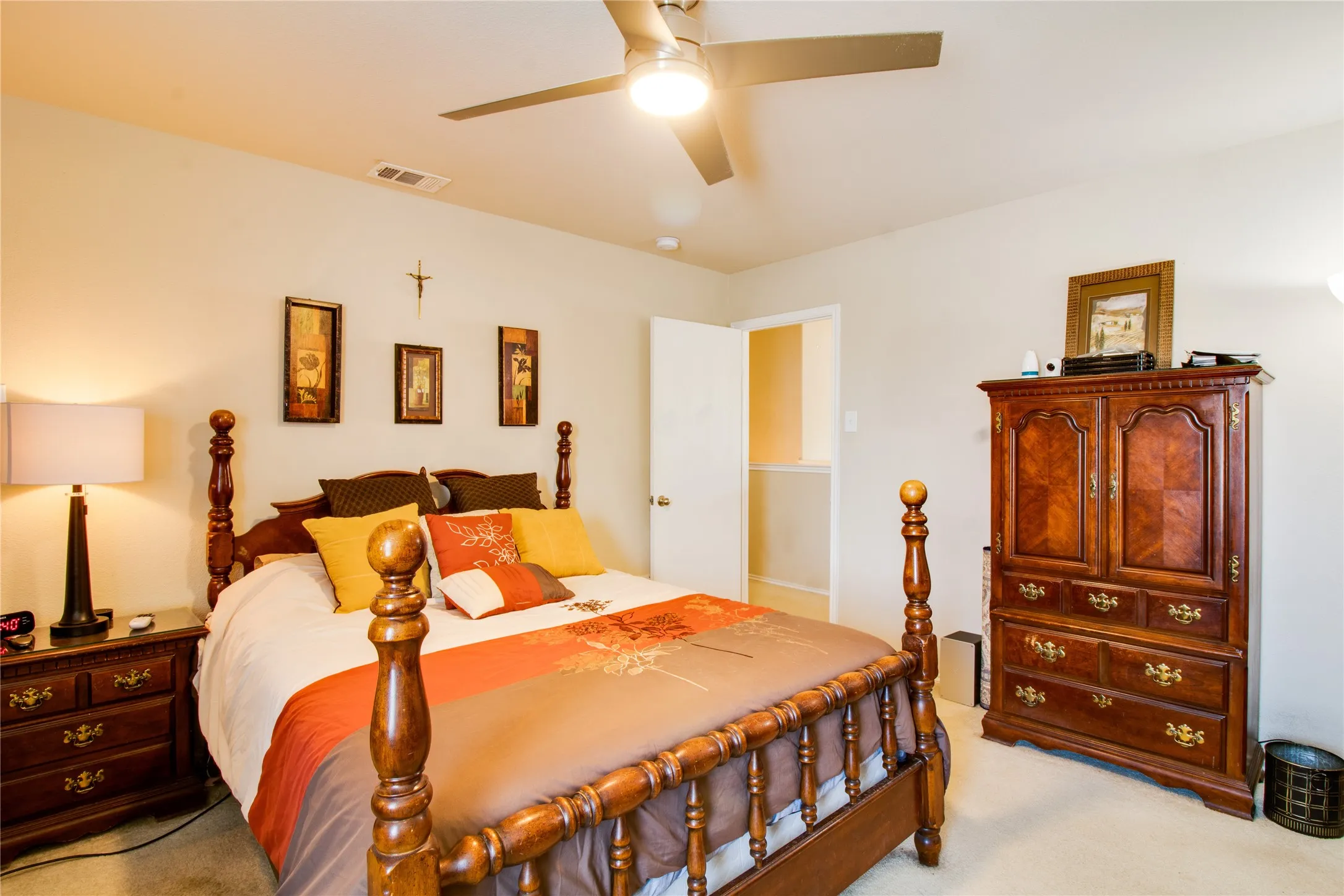 Light-toned walls complement plush carpeting
