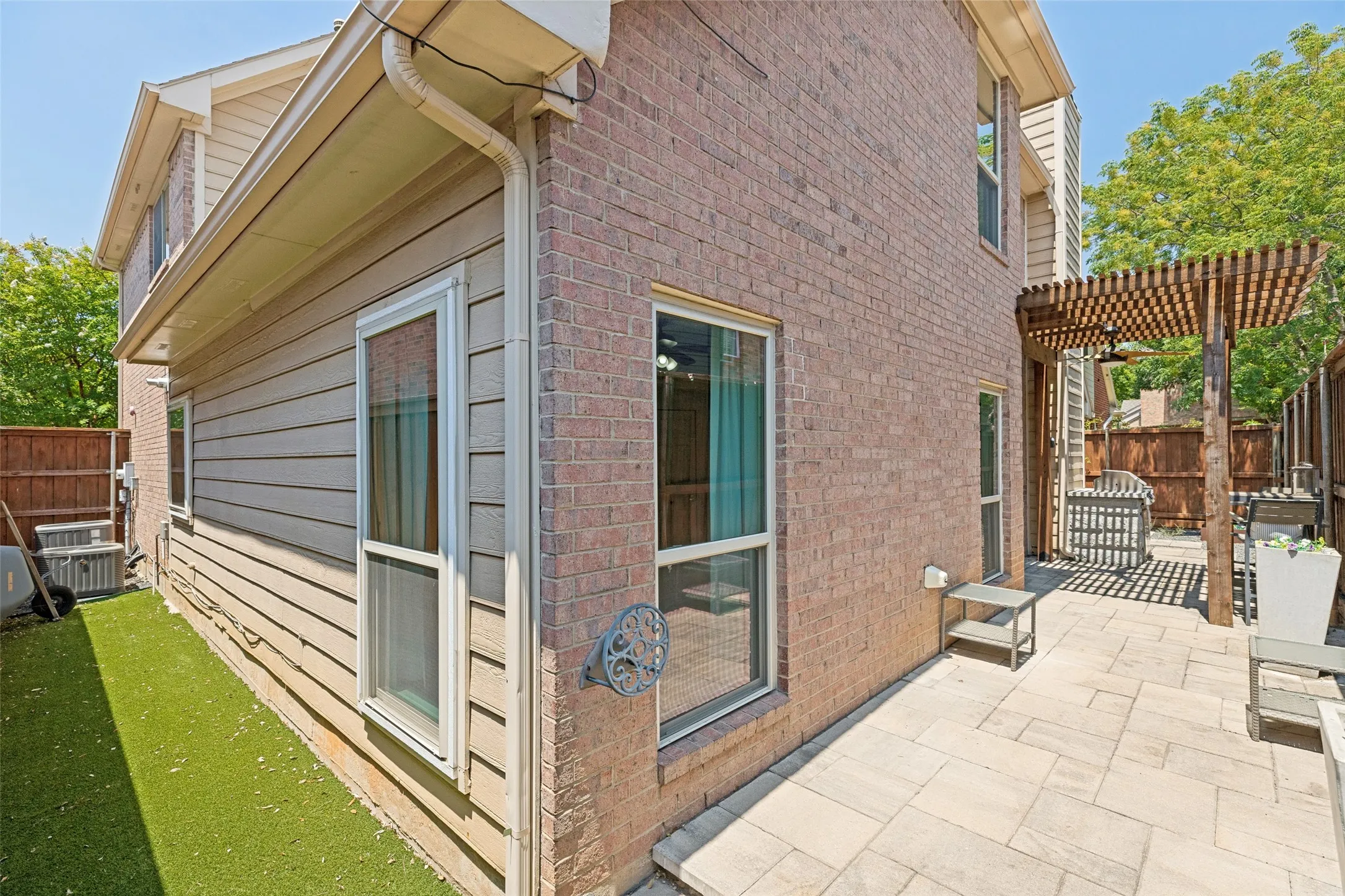 Low Maintenance Backyard with Turf or Cement Throughout