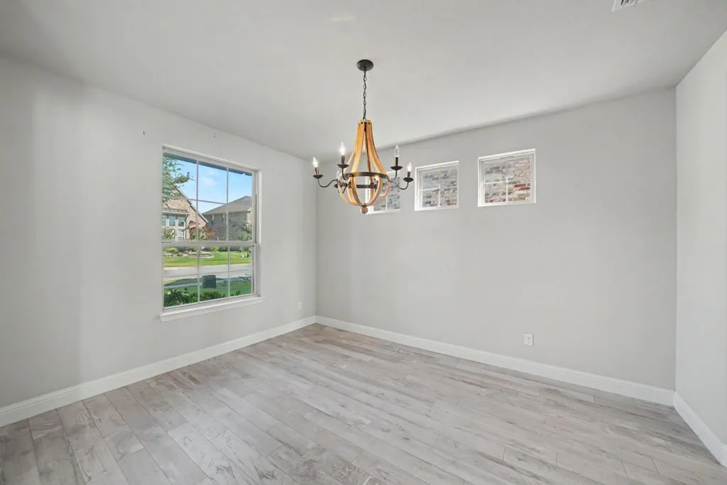 Wood-finish flooring with crisp white trim
