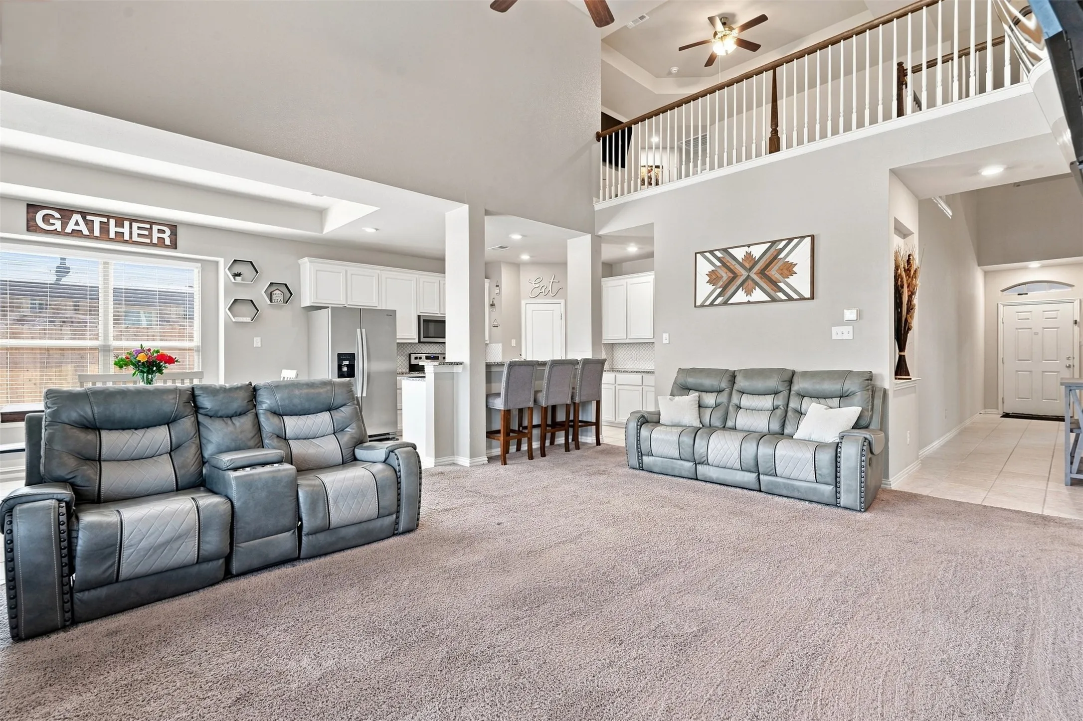 Great room with vaulted ceilings and an open-concept layout
