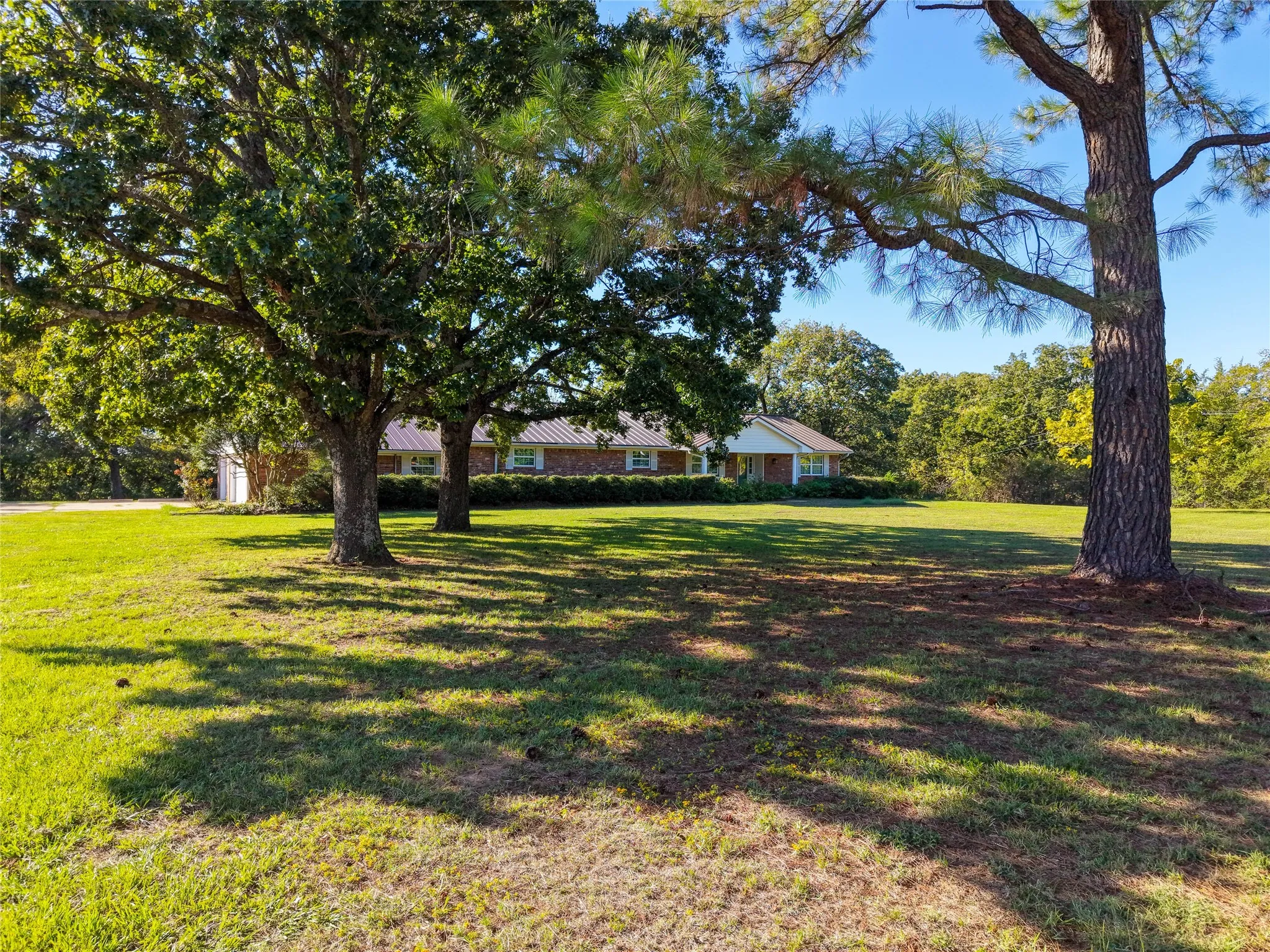 The canopy of trees provides privacy even though you a minutes from both Denison and Sherman