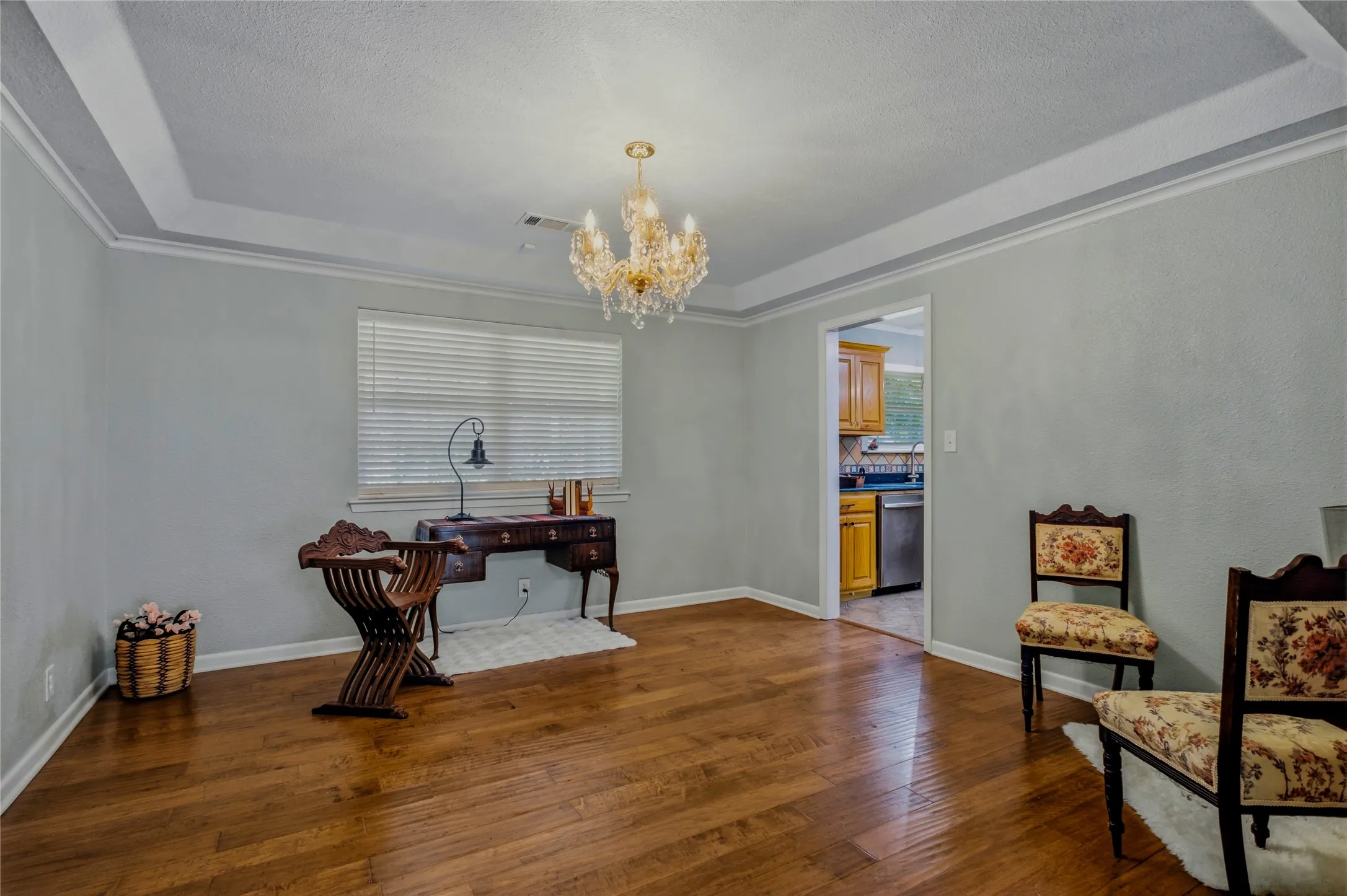 Here, the current office shows the size of this room.  It has ample room so use it as an office or sitting room or even convert it to another bedroom.