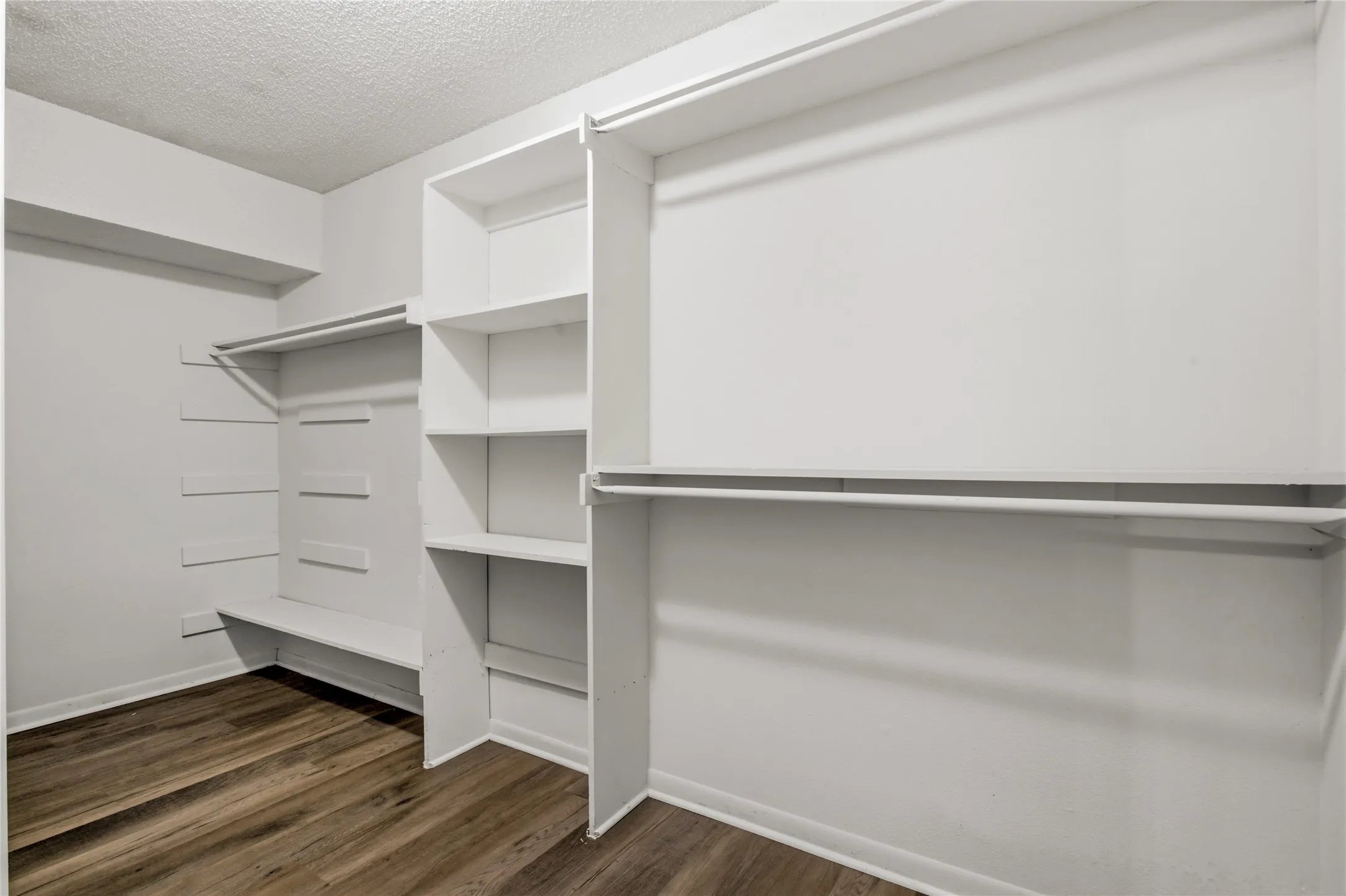 The closet for bedroom 4.  There is more storage space on the opposite wall.