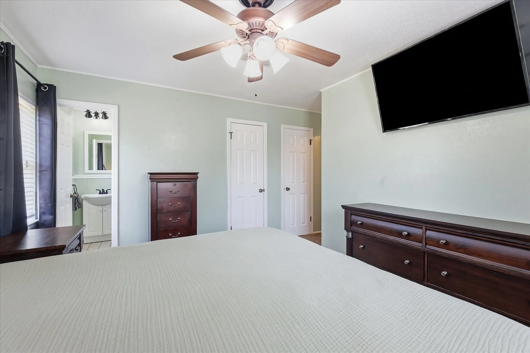 Walk in closet in bedroom.
