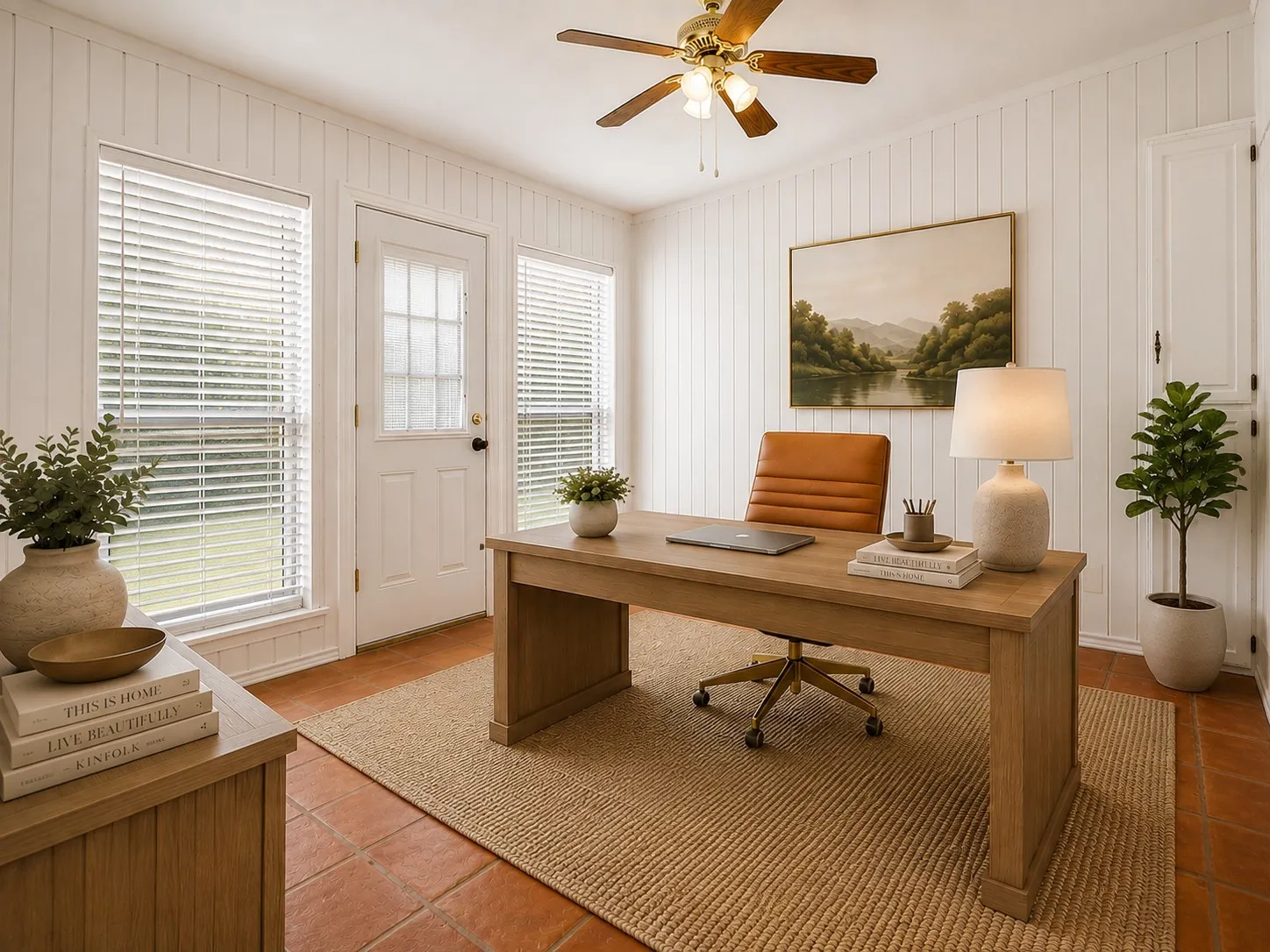 Sunroom with Saltillo tile floor, virtually staged as an office