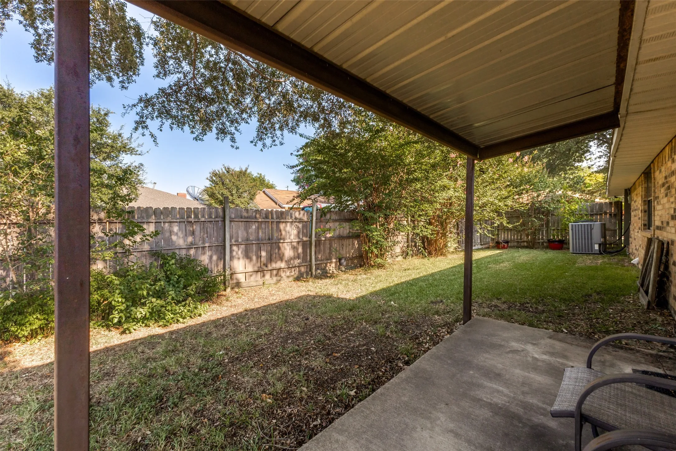 Enjoy being outdoors with the covered patio and large landscaped backyard.