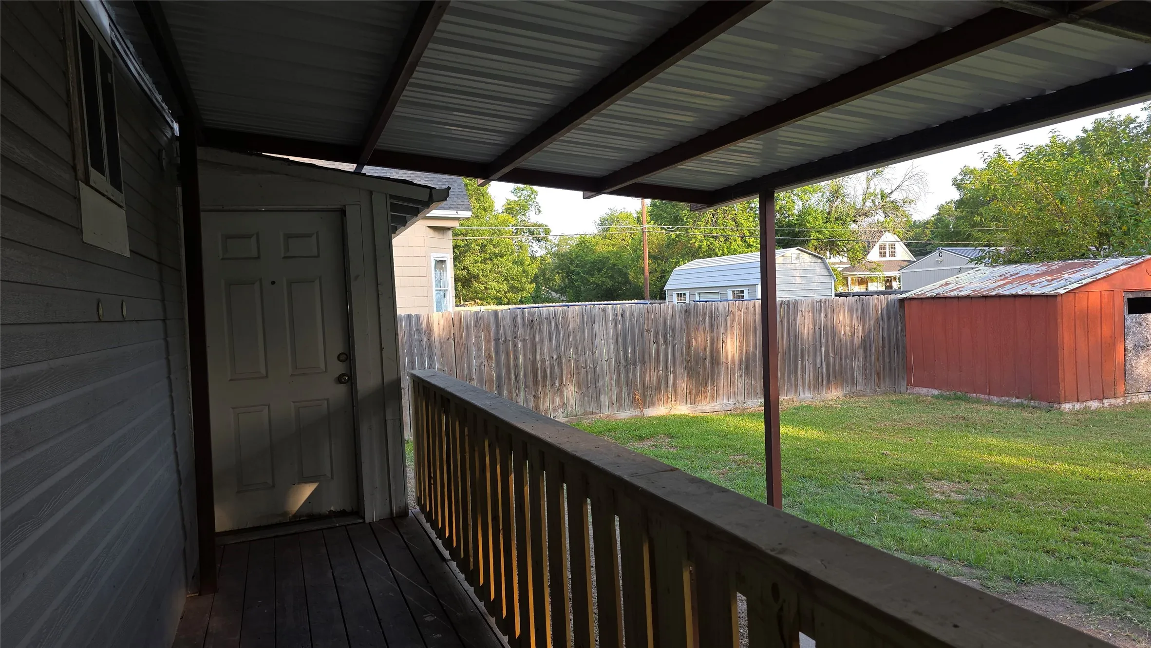 Covered back porch and storage room