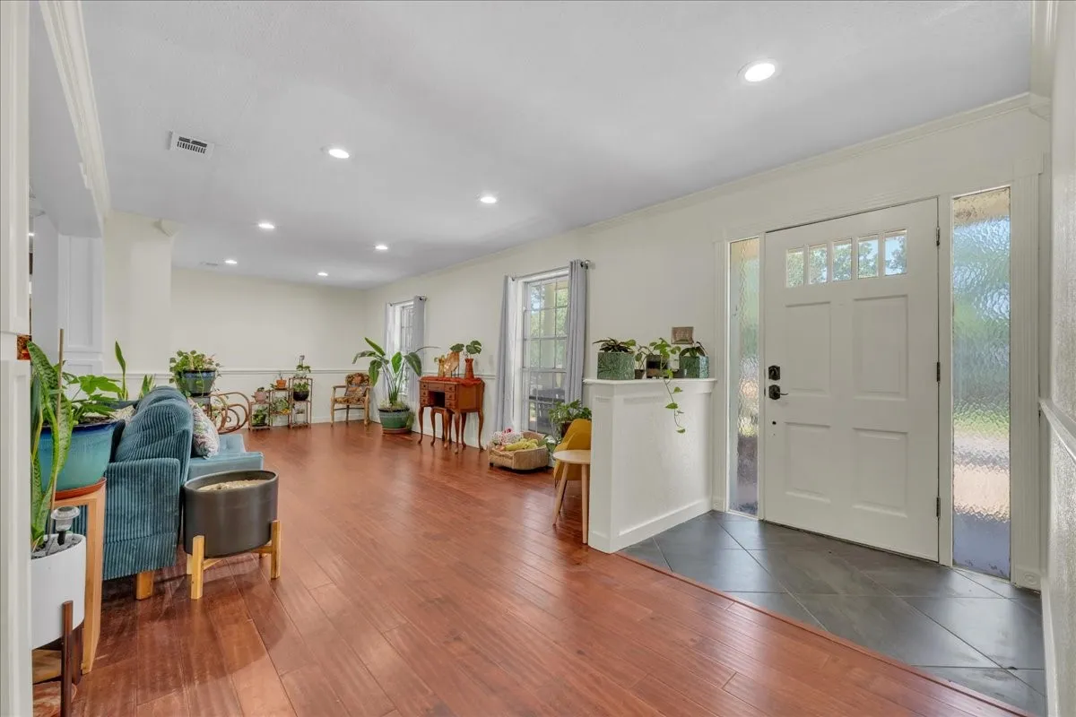 Entry showing formal dining area towards the back.