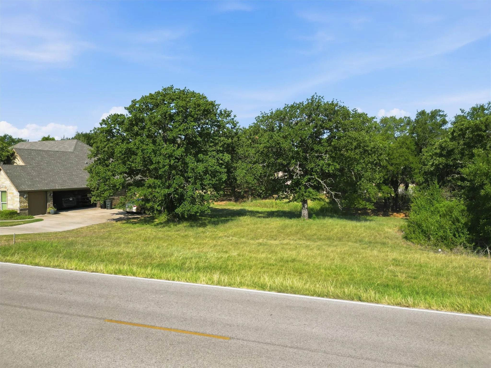 Improved Land For Sale in Hood County , 7012 Westover Drive, Granbury, Texas 76049, 0, 0, Garage spaces, 0 Sqft, built in 0, Price $59,900, mls#21350391, Real Estate Agent in Granbury, Homes For Sale in Hood county, Homes For Sale in Granbury, Realtor in Granbury Texas, Real Estate Brokerage Independent Realty Texas, Luminita Cordes Realtor