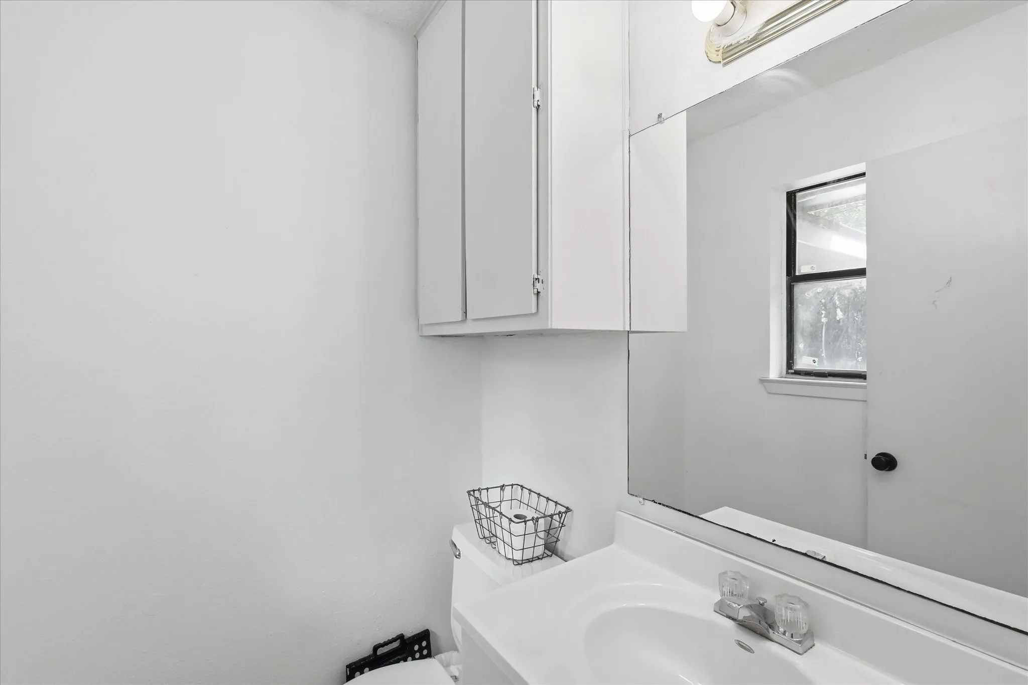 Primary half bath.