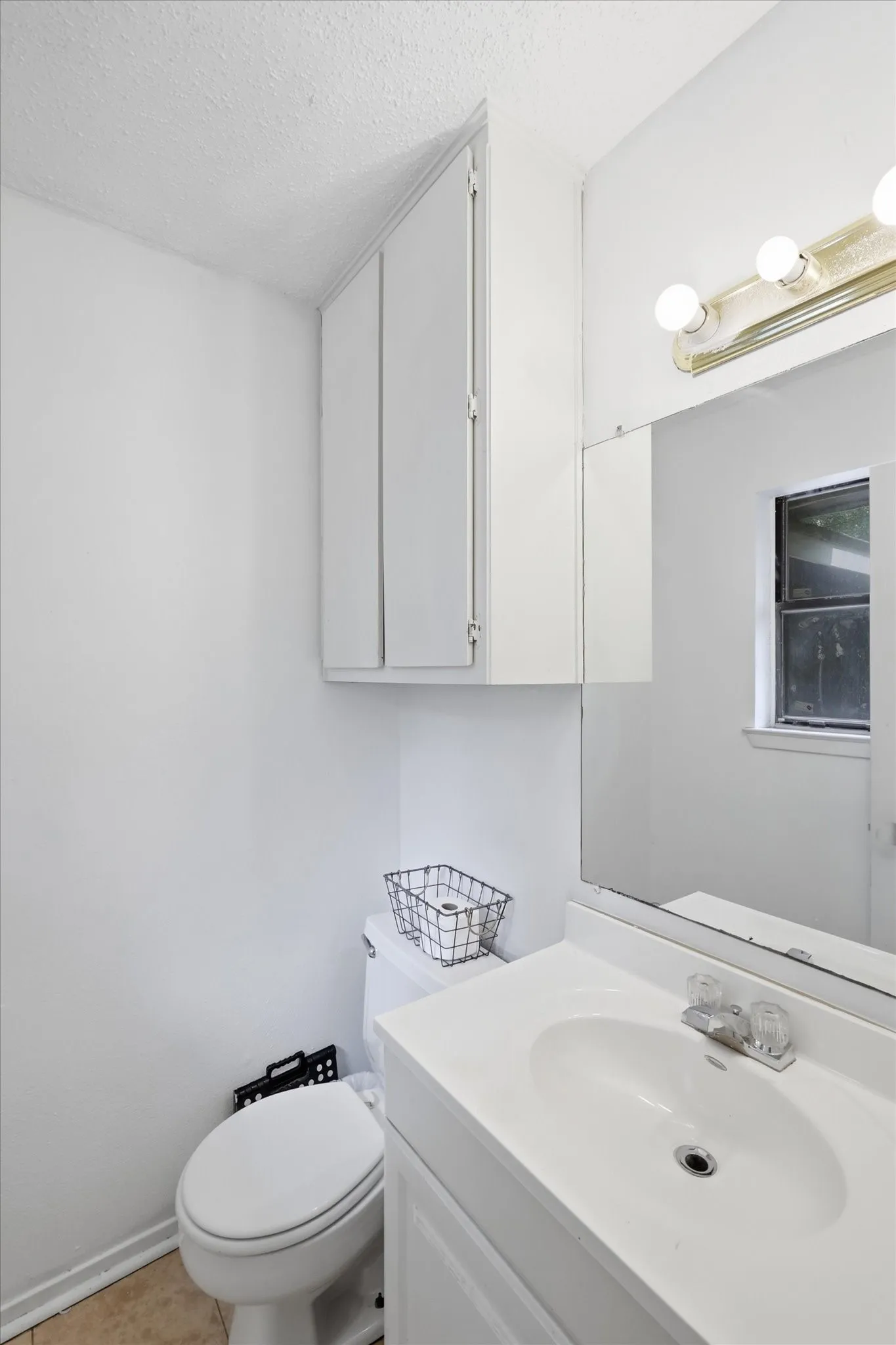 Primary half bath.