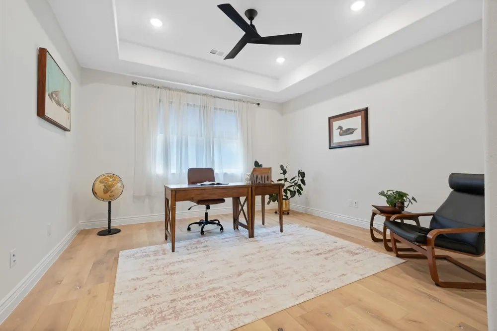 Large Office has Frosted French Doors if privacy is needed