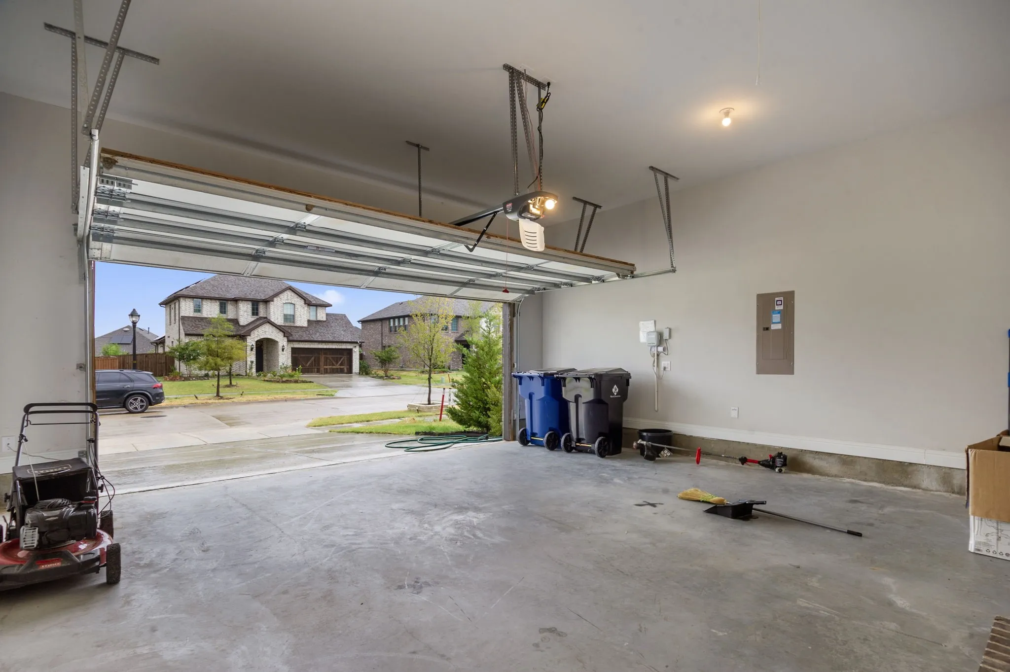 Garage featuring electric panel