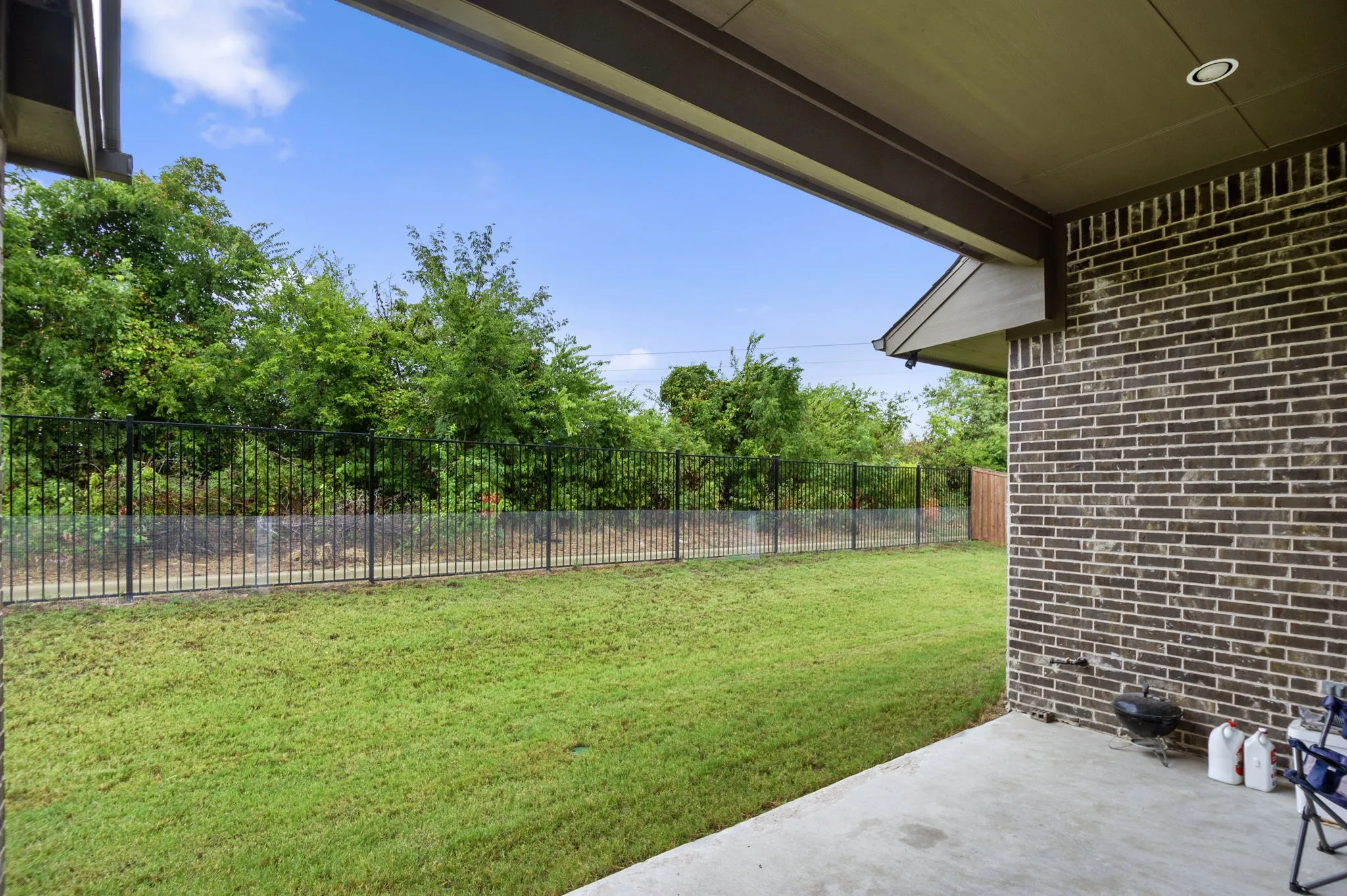 View of yard with a patio area