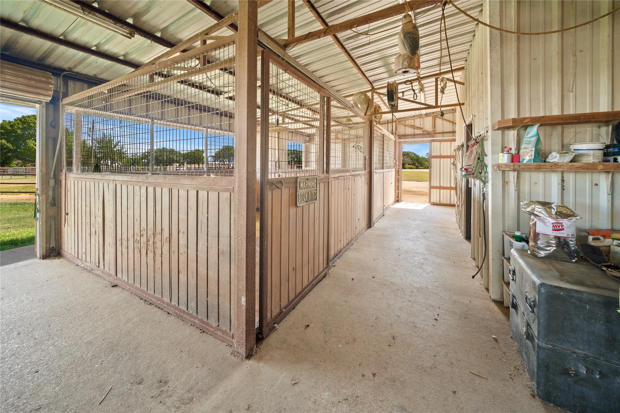 Barn with 4 stalls with tack room and seperate feed room