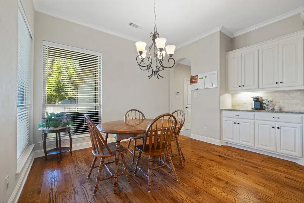 Breakfast area with more cabinets and serving space for a coffee bar.