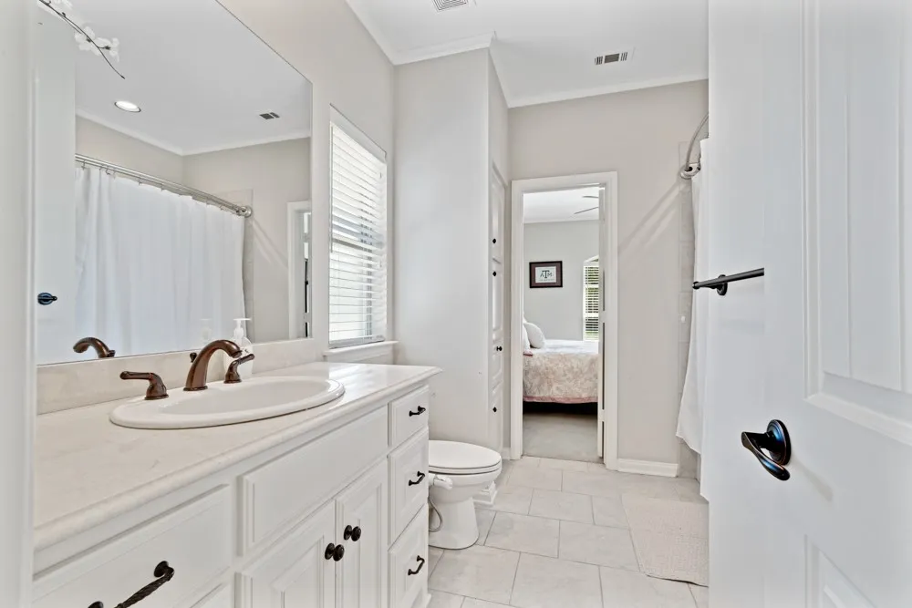 Jack & Jill bathroom between secondary bedrooms making both ensuites.